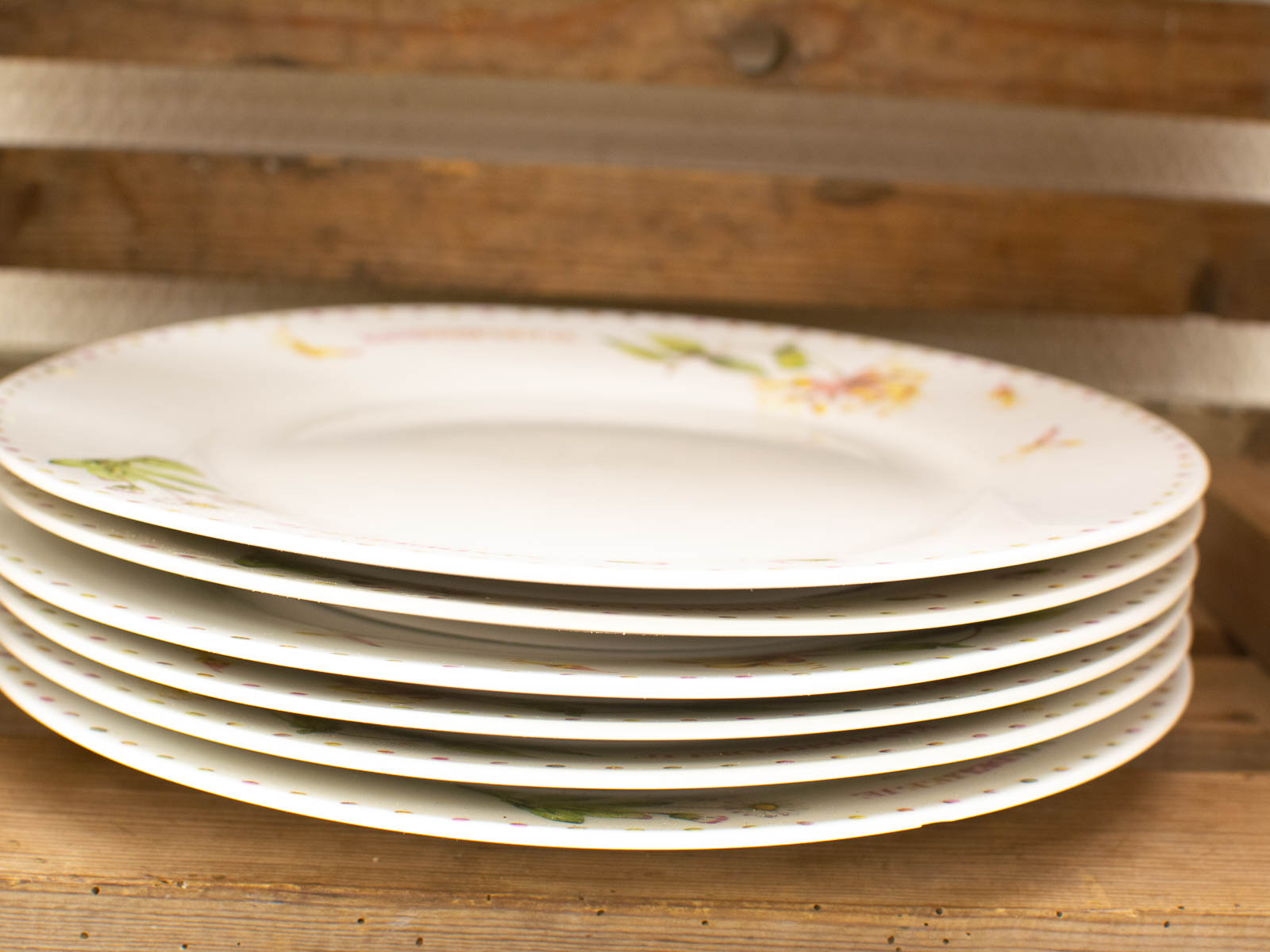 Elegant vintage plates with floral patterns, perfect for adding charm to your dining experience.