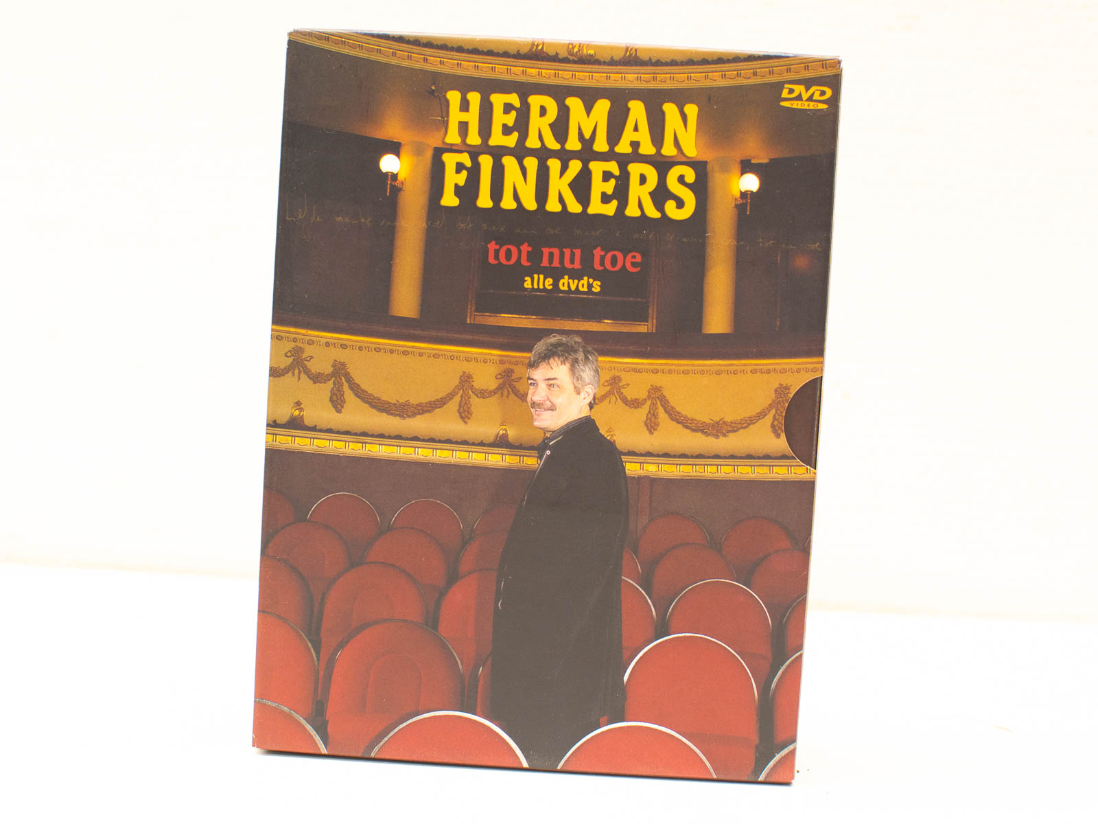 Herman Finkers DVD cover: a collection of laughter and theatrical joy from the beloved comedian.