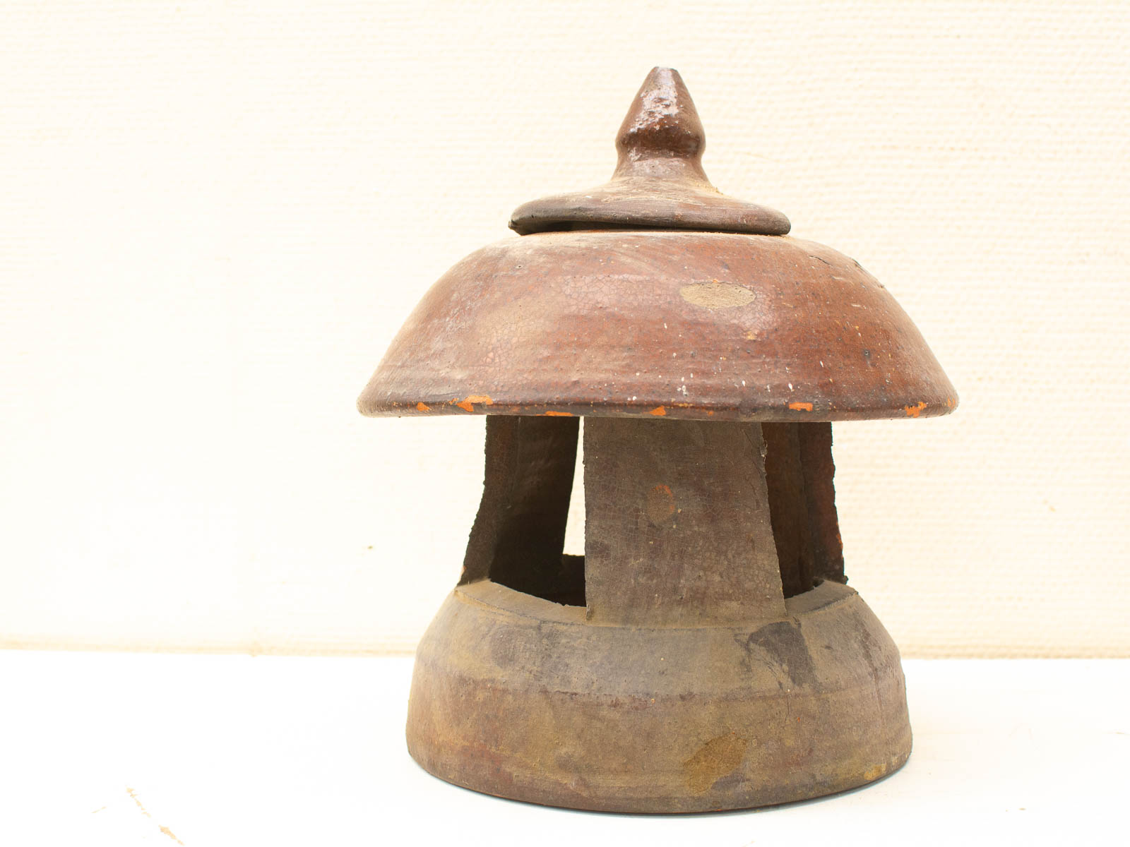 Vintage mushroom-shaped pottery lamp, perfect for adding rustic charm and warmth to any decor.