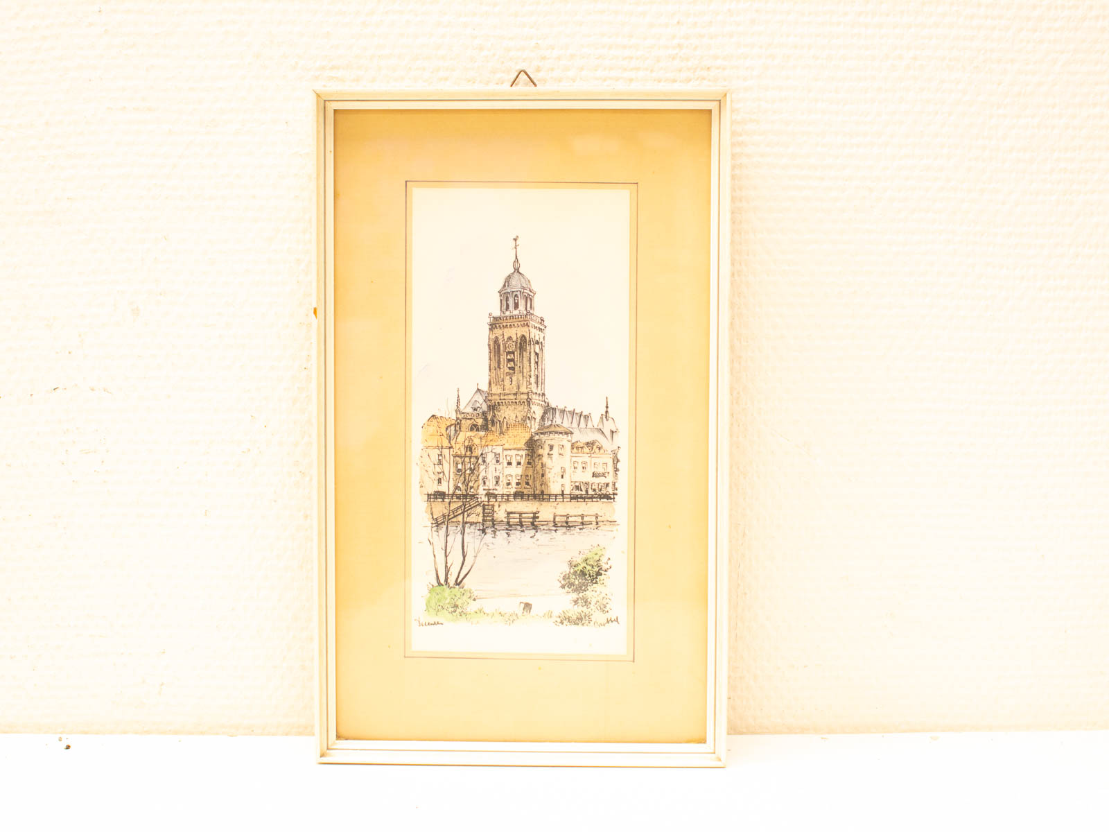 Charming architectural illustration of a clock tower in soft hues, elegantly framed for any space.