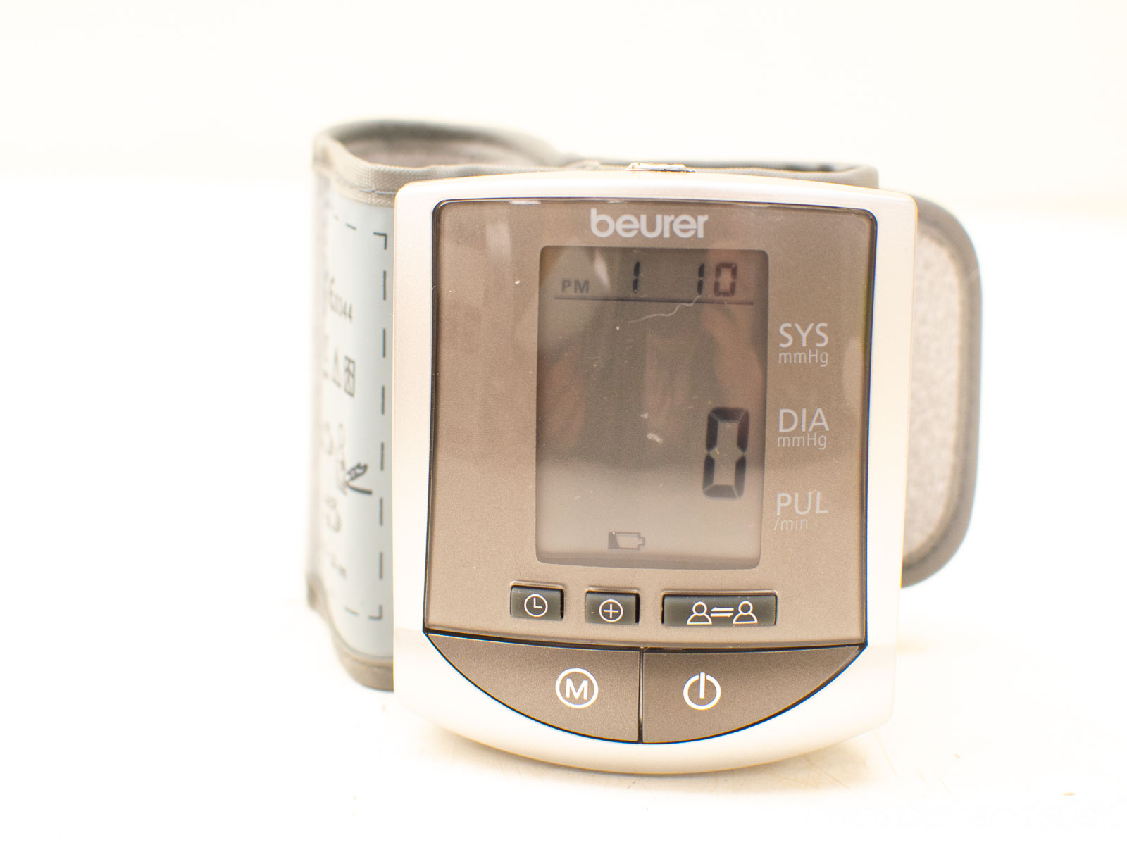 Sleek digital blood pressure monitor with easy-to-read display and comfortable cuff for home use.