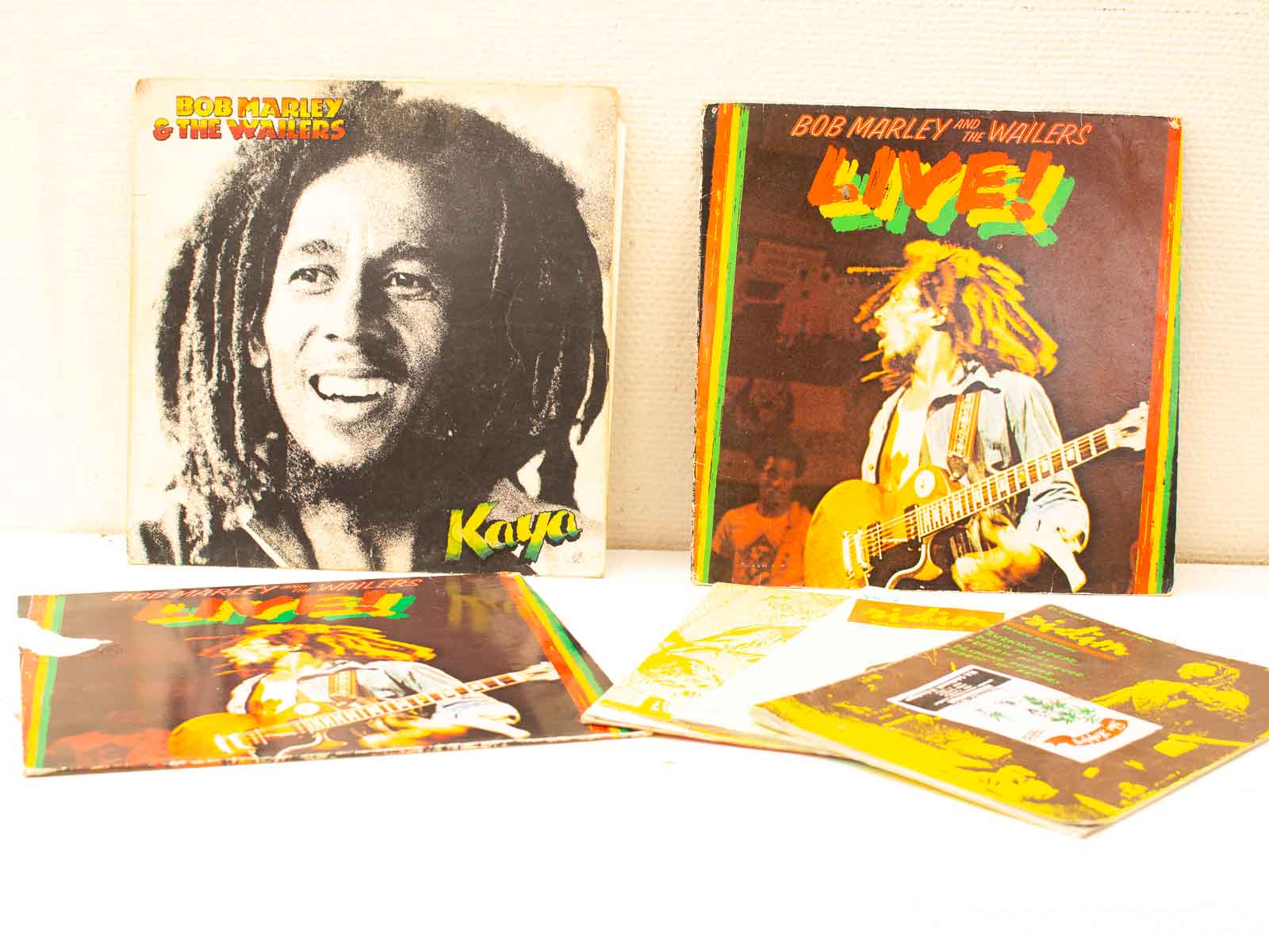 Bob Marley vinyl collection featuring Kaya and Live! albums, celebrating reggae legacy and culture.