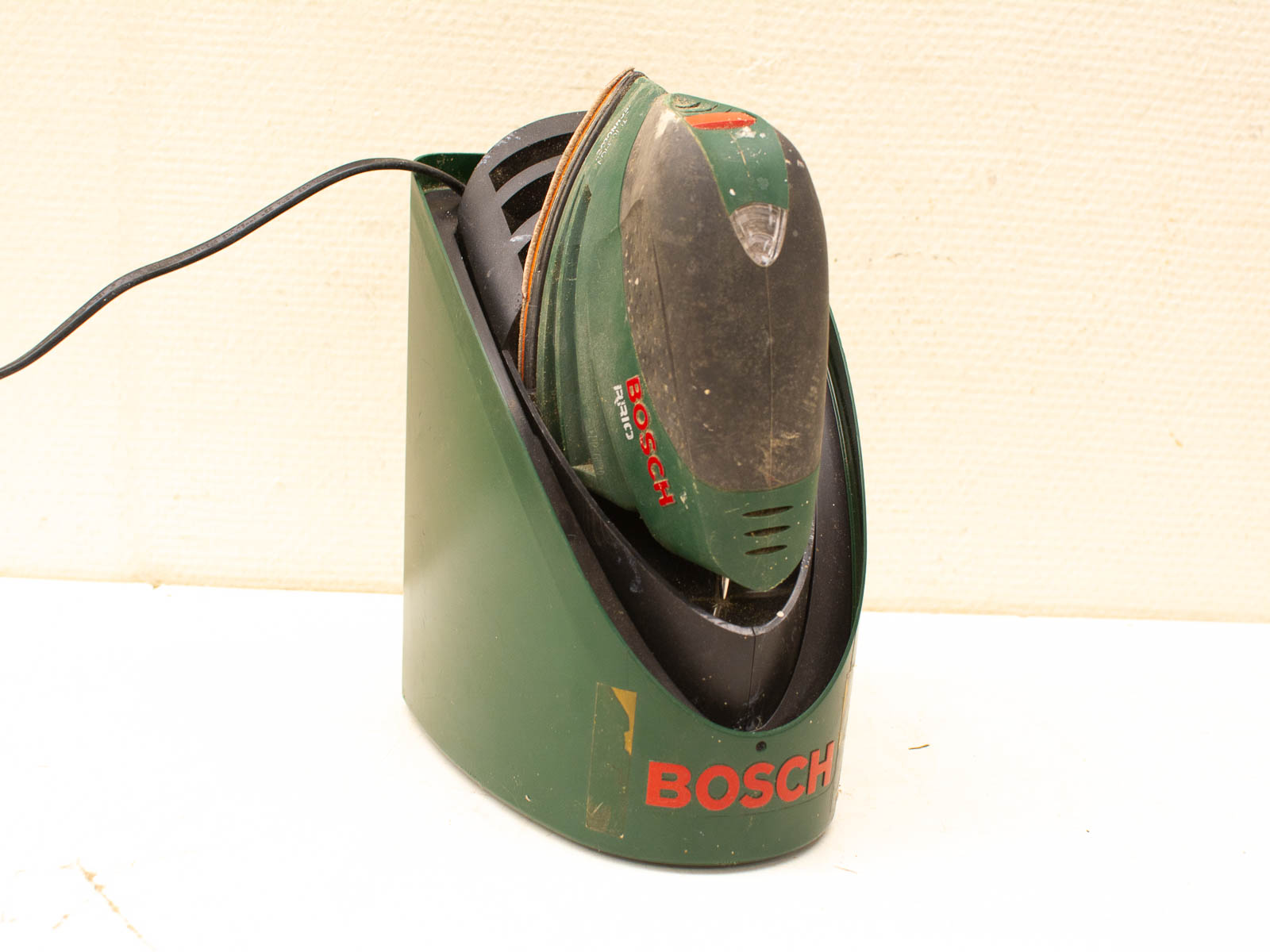 Reliable Bosch power tool charger, sleek design, perfect for home improvement enthusiasts.