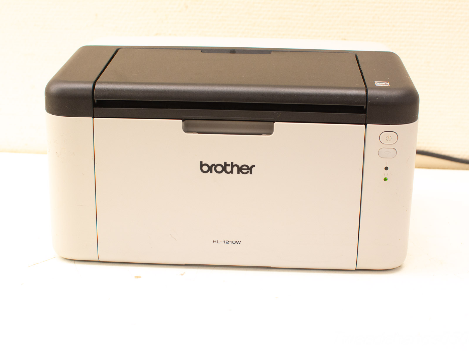 Brother HL-1210W laser printer: compact, reliable, efficient printing for home and small offices.