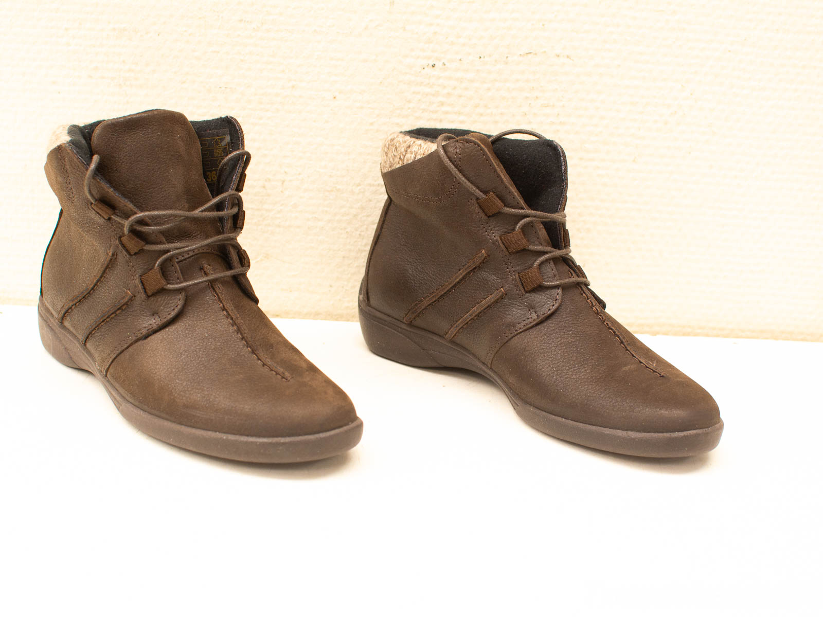 Stylish brown leather ankle boots, perfect blend of comfort and elegance for any occasion.