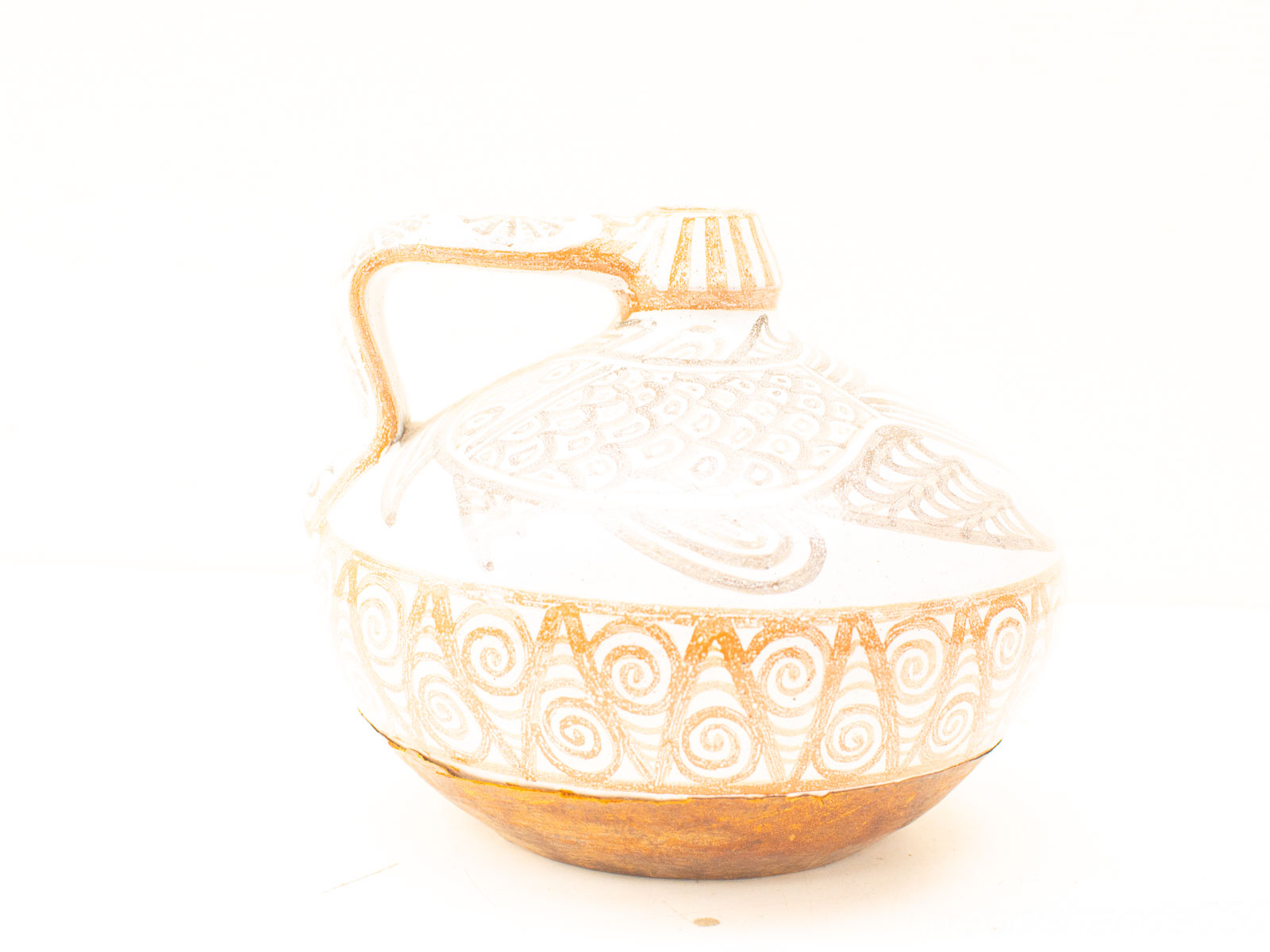 Handcrafted ceramic jug with intricate patterns, elegant design, and a natural earthy finish.