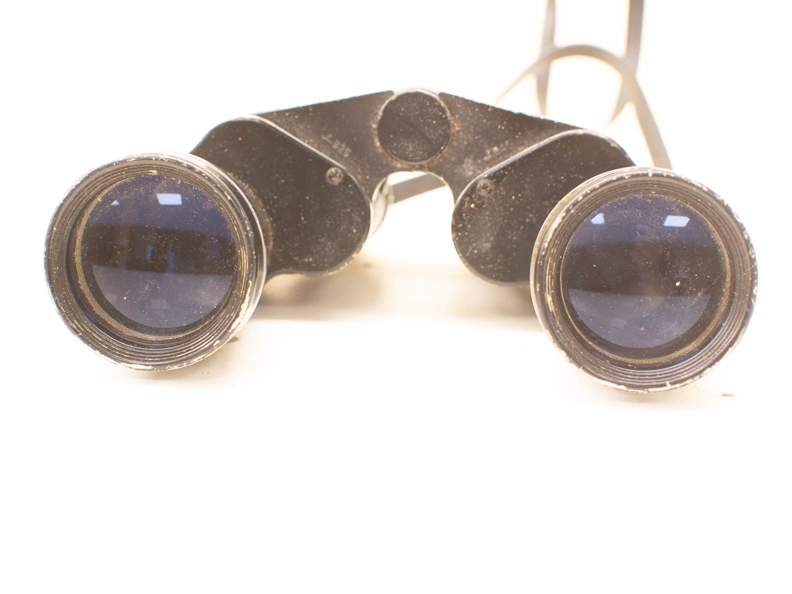 Vintage binoculars with wear, perfect for nature lovers and adventure seekers.