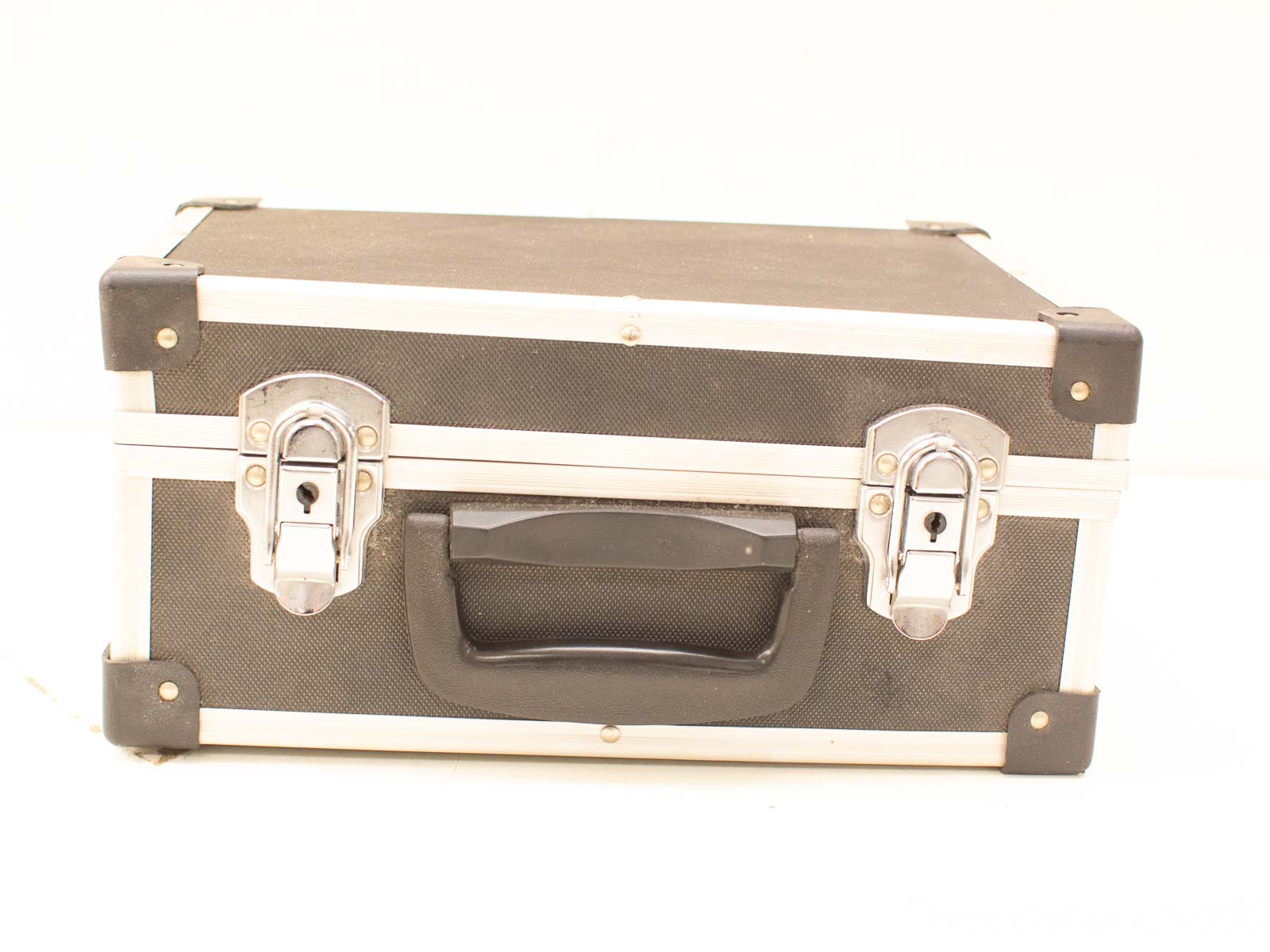 Durable black storage case with silver accents, ideal for tools and personal belongings.