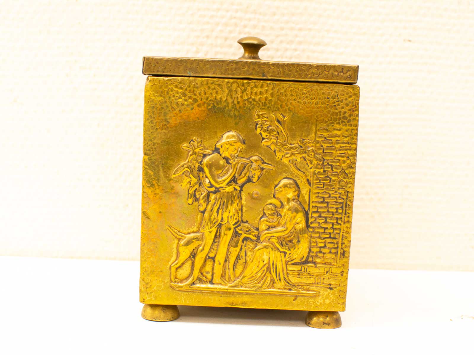 Vintage brass decorative box with engraved pastoral scene and nature motifs. Perfect for collectors!