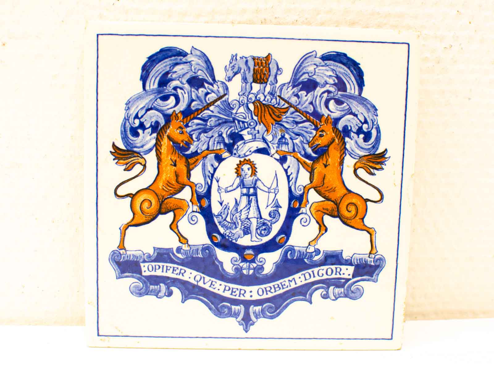 Vibrant heraldic tile with unicorns, justice symbol, and Latin motto on honor and recognition.