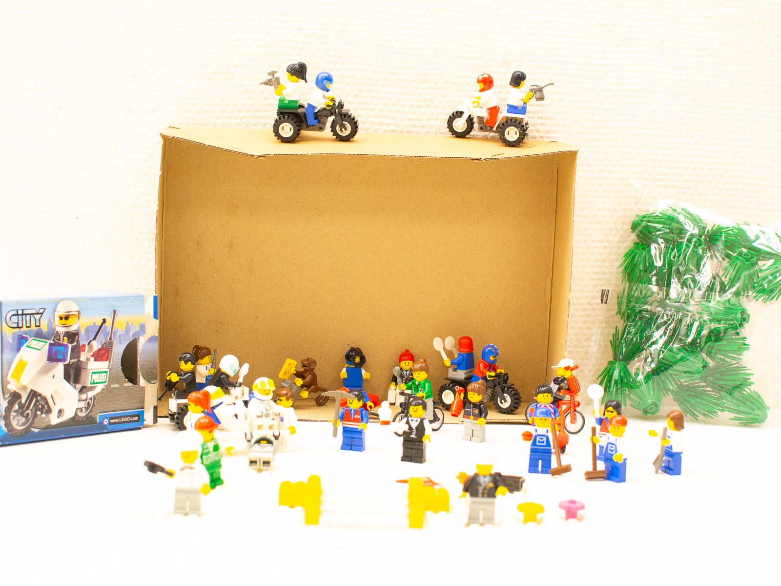 Dynamic LEGO city scene with colorful characters and motorcycles, perfect for imaginative play.