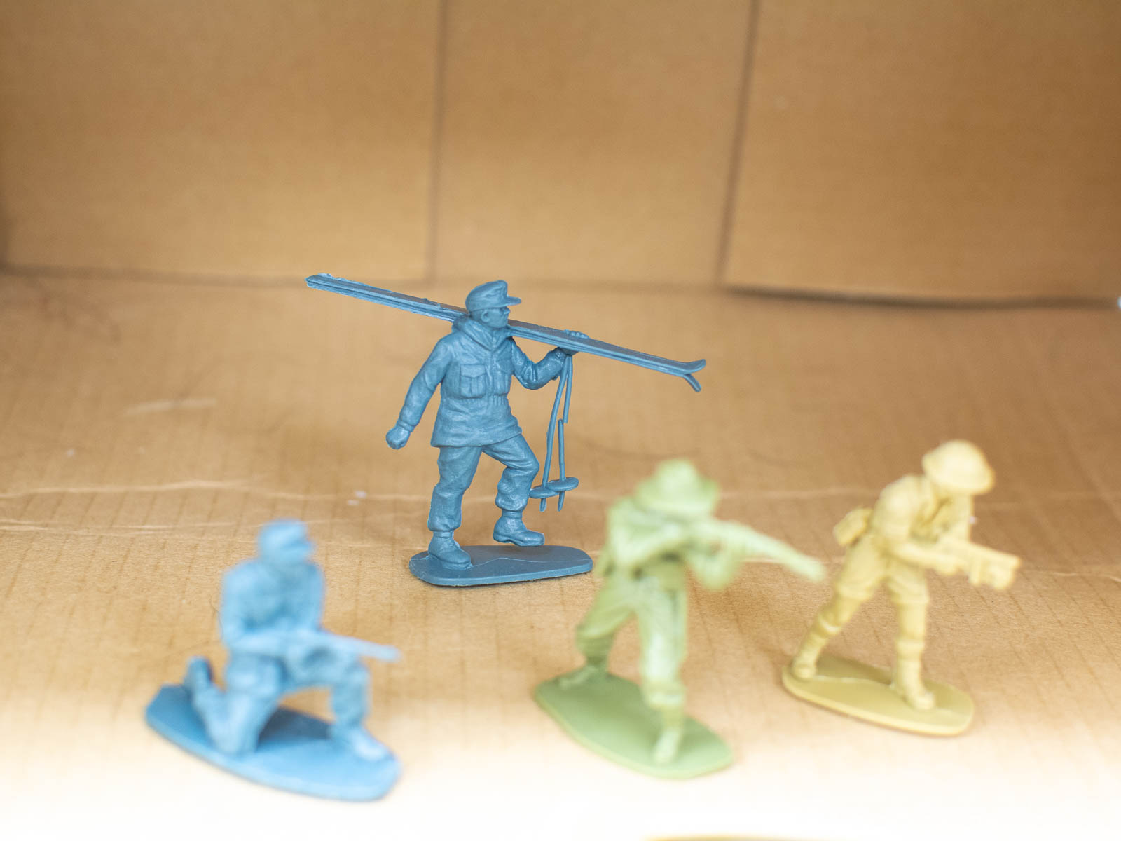 Colorful miniature toy soldiers in dynamic poses, perfect for imaginative play and nostalgia.