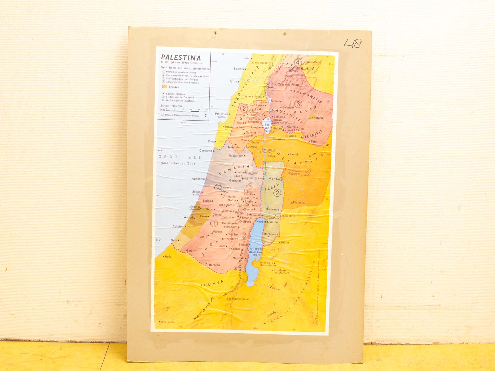 Vintage Palestina map highlighting regions and landmarks, ideal for history enthusiasts and collectors.