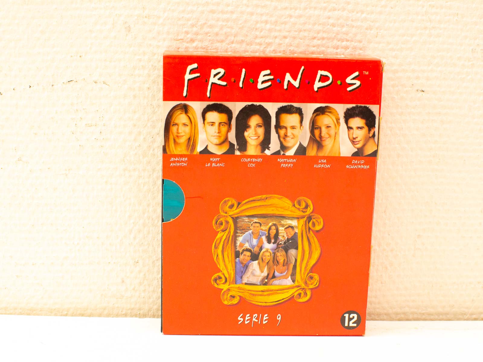 Friends Season 9 DVD box set featuring vibrant art and beloved cast photos, celebrating friendship.