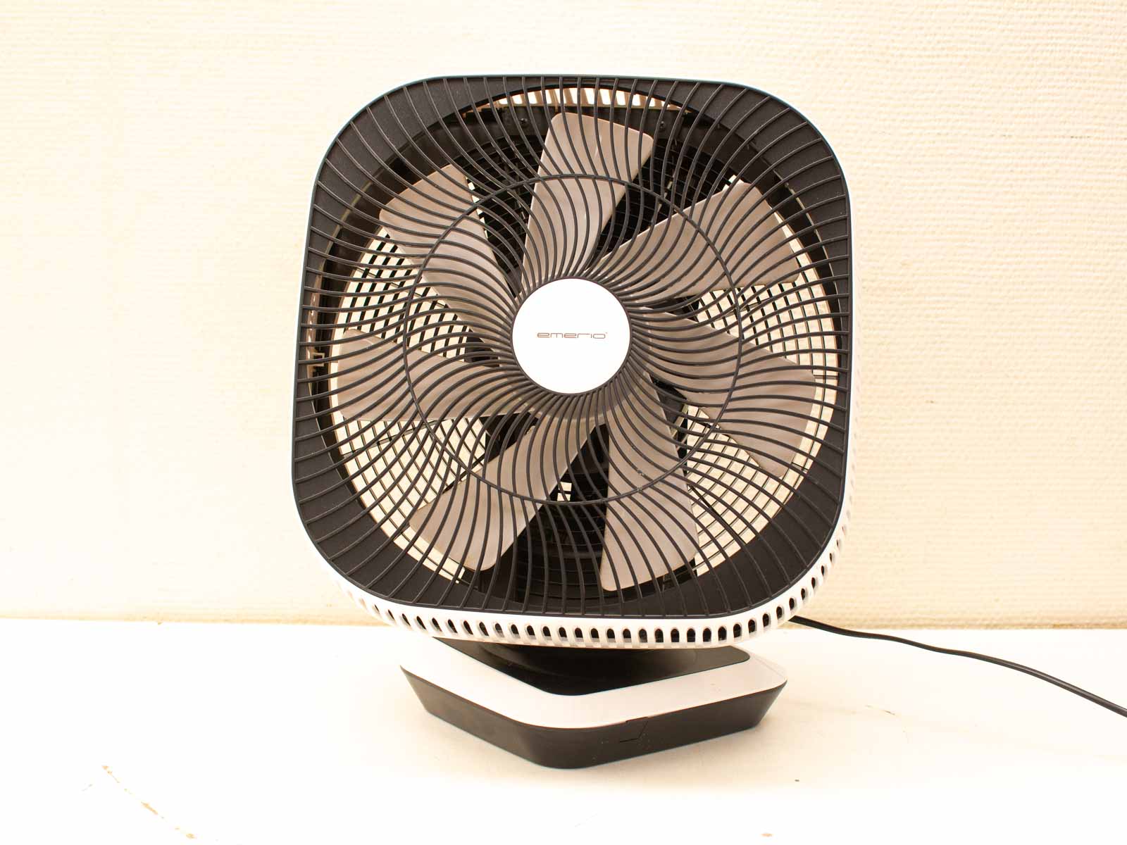 Sleek black tabletop fan with efficient airflow and modern minimalist design for stylish comfort.