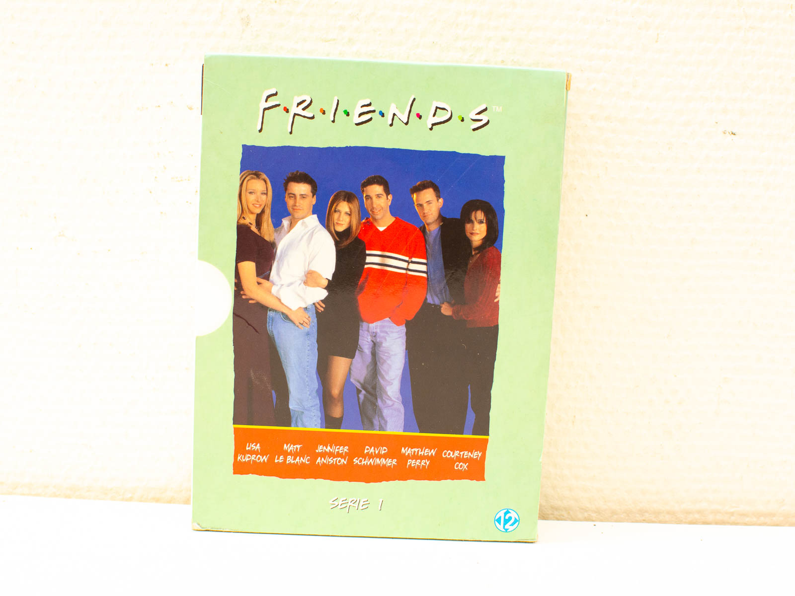 Complete DVD Collection: Friends cover with vibrant colors and iconic cast in stylish outfits.