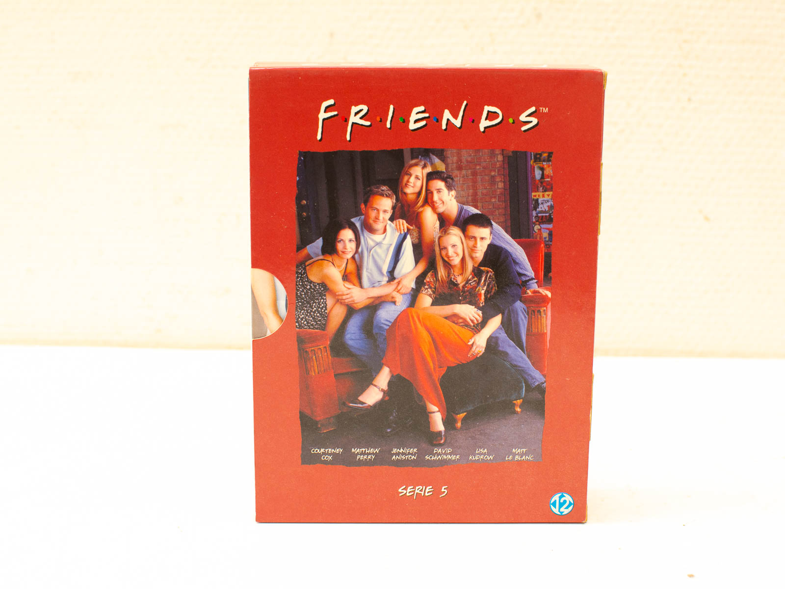 Friends Season 5 DVD box set: vibrant design showcasing friendship and humor with iconic cast.