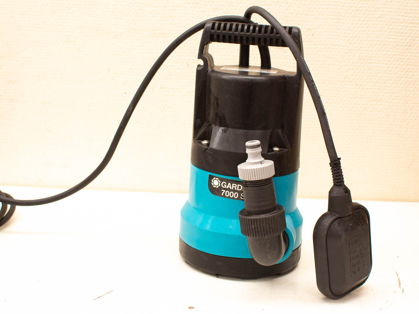 Stylish dual-tone submersible pump for efficient water removal in homes, pools, and yards.