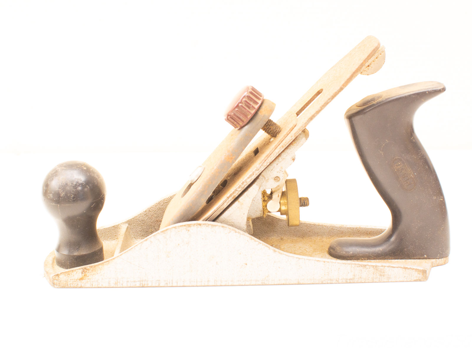 Ergonomic vintage woodworking hand plane for precise shaping and smoothing of wood surfaces.