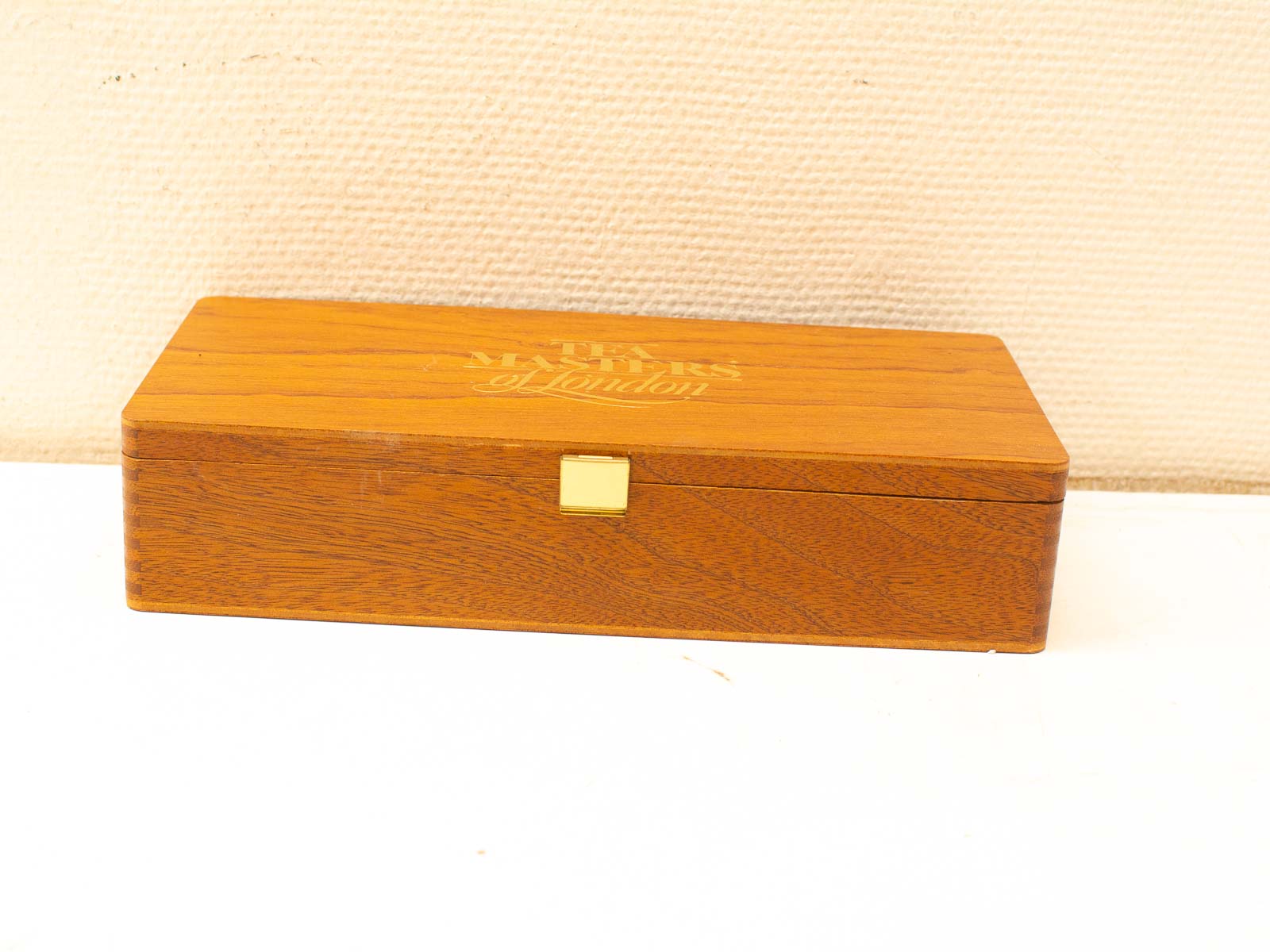 Elegant wooden box with THE MYSTERS of London inscription, perfect for treasures and collectibles.