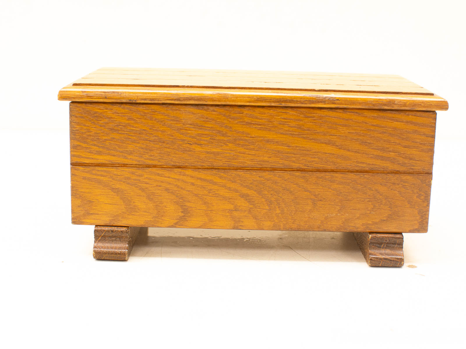 Elegant oak vintage box with compartments for stylish storage and rustic decor.