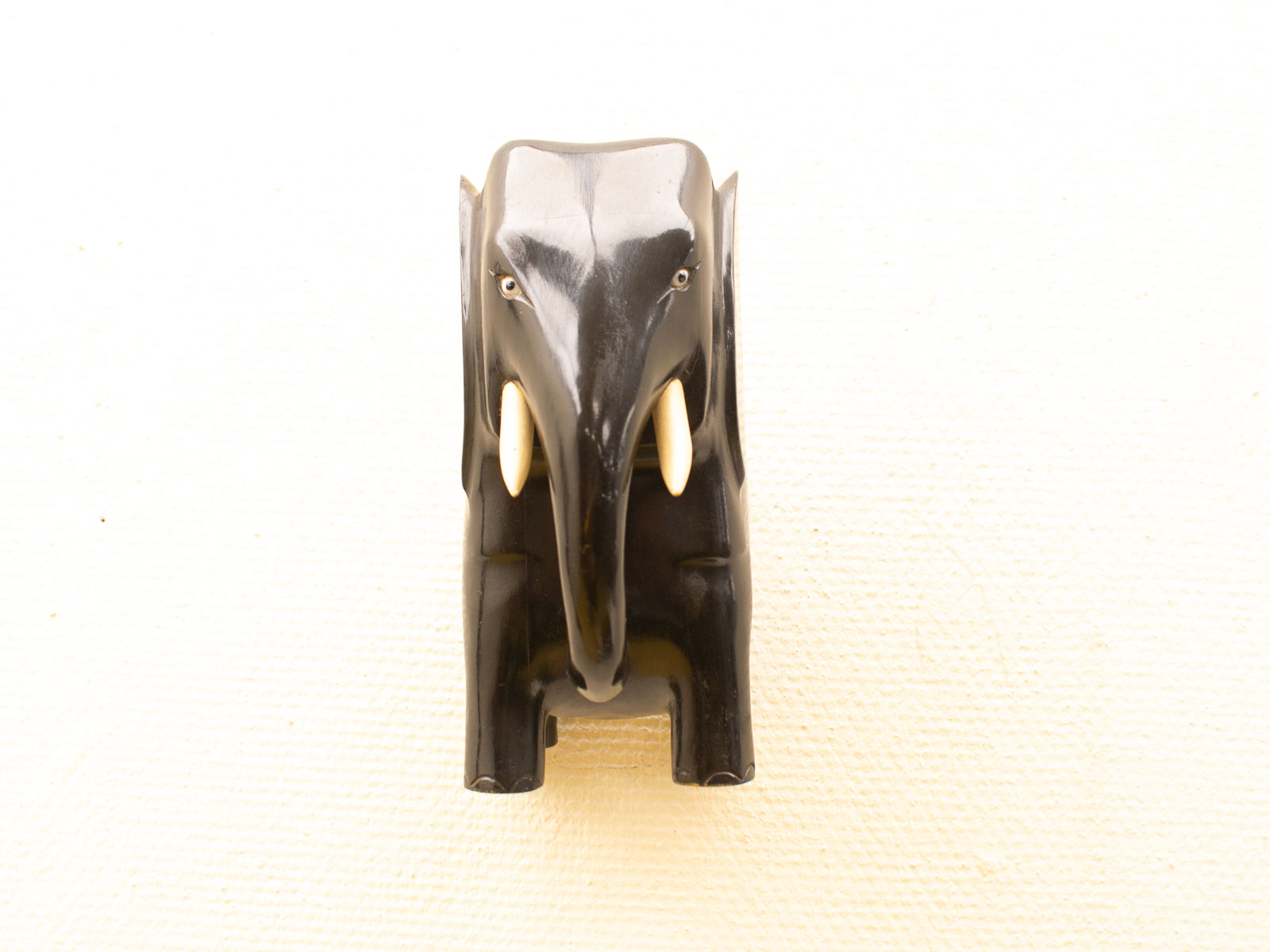 Elegant black elephant sculpture in high-quality materials, perfect for collectors and stylish decor.