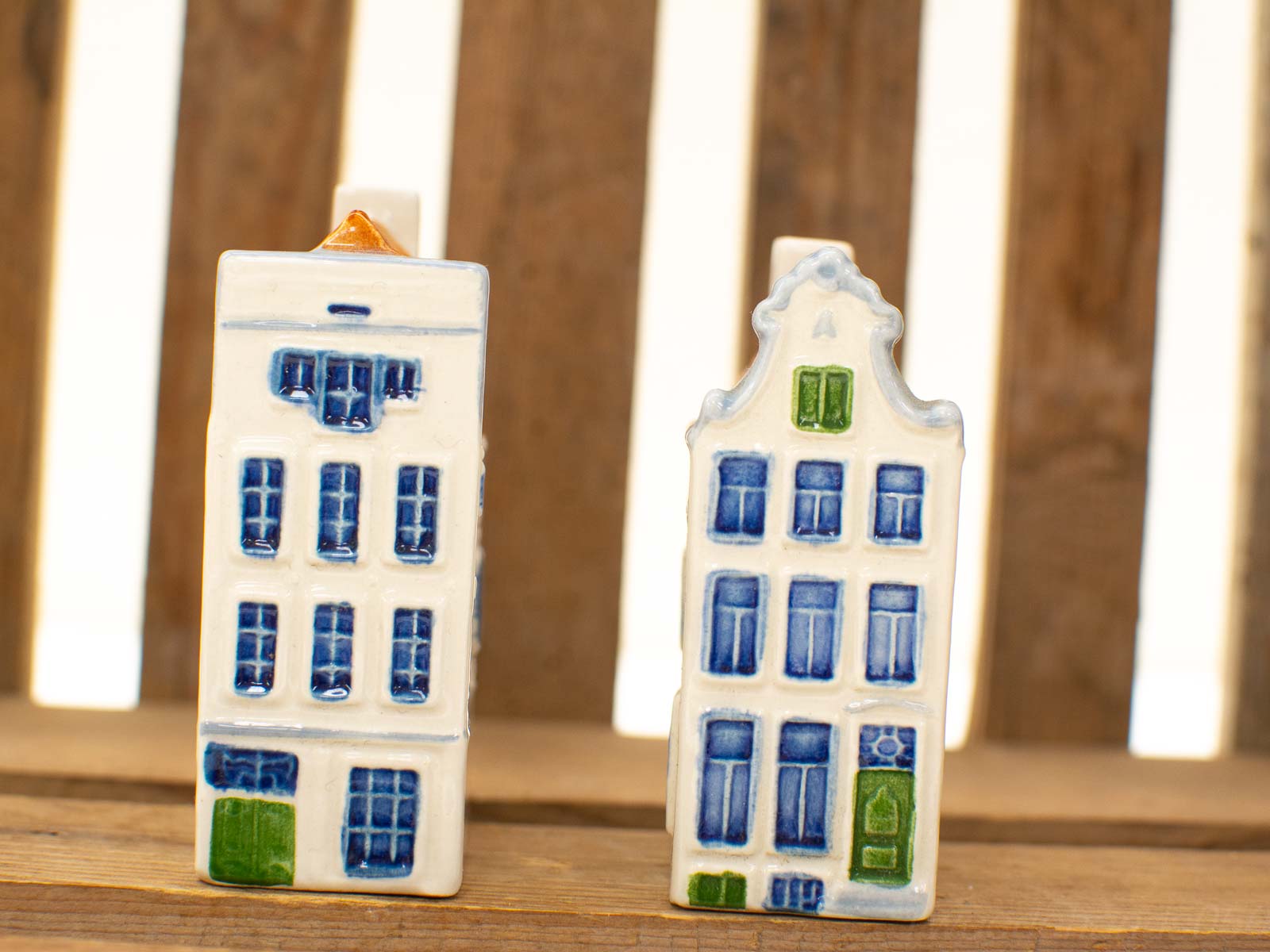 Charming ceramic Dutch house figurines showcasing vibrant colors and intricate architectural details.