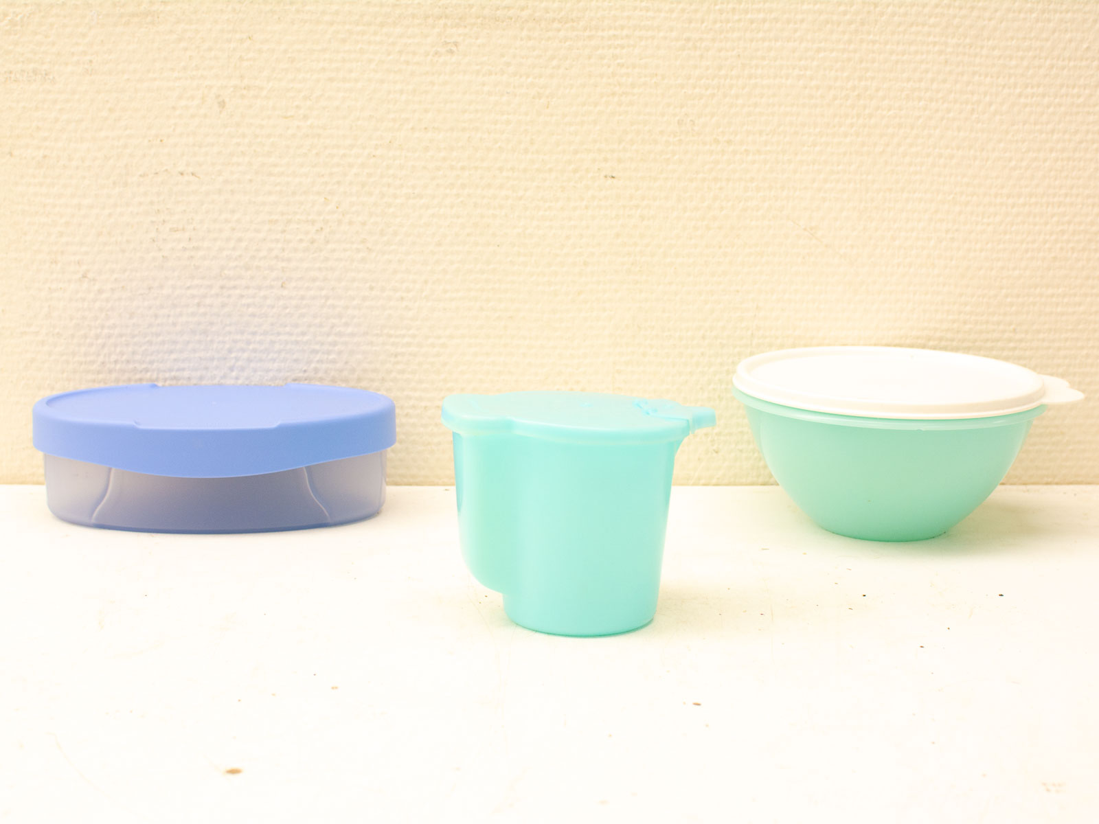 Vibrant plastic storage containers for a stylish, organized kitchen.