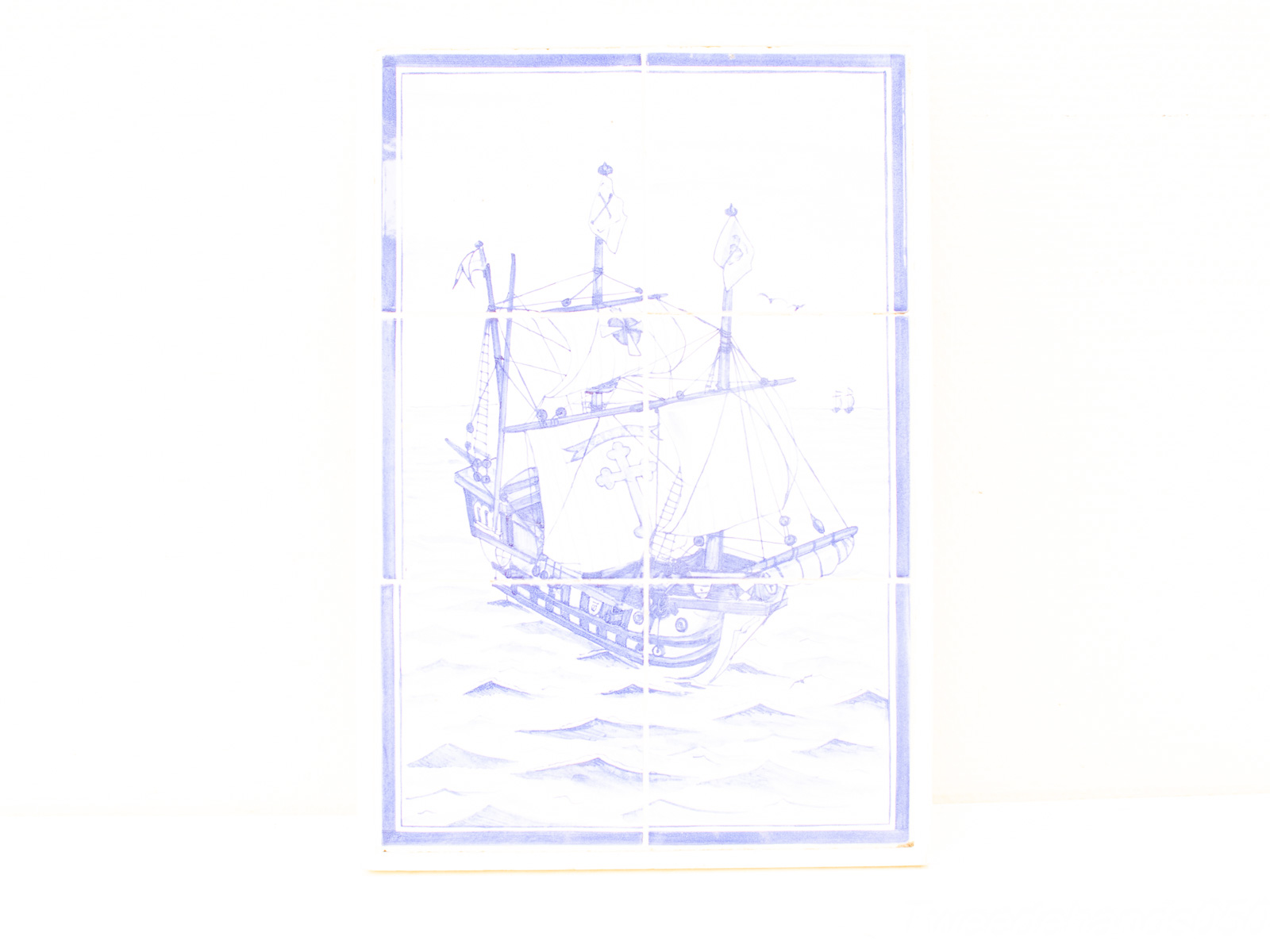 Historic ship sailing on tranquil waves, inspired by Delftware art, capturing maritime adventure.