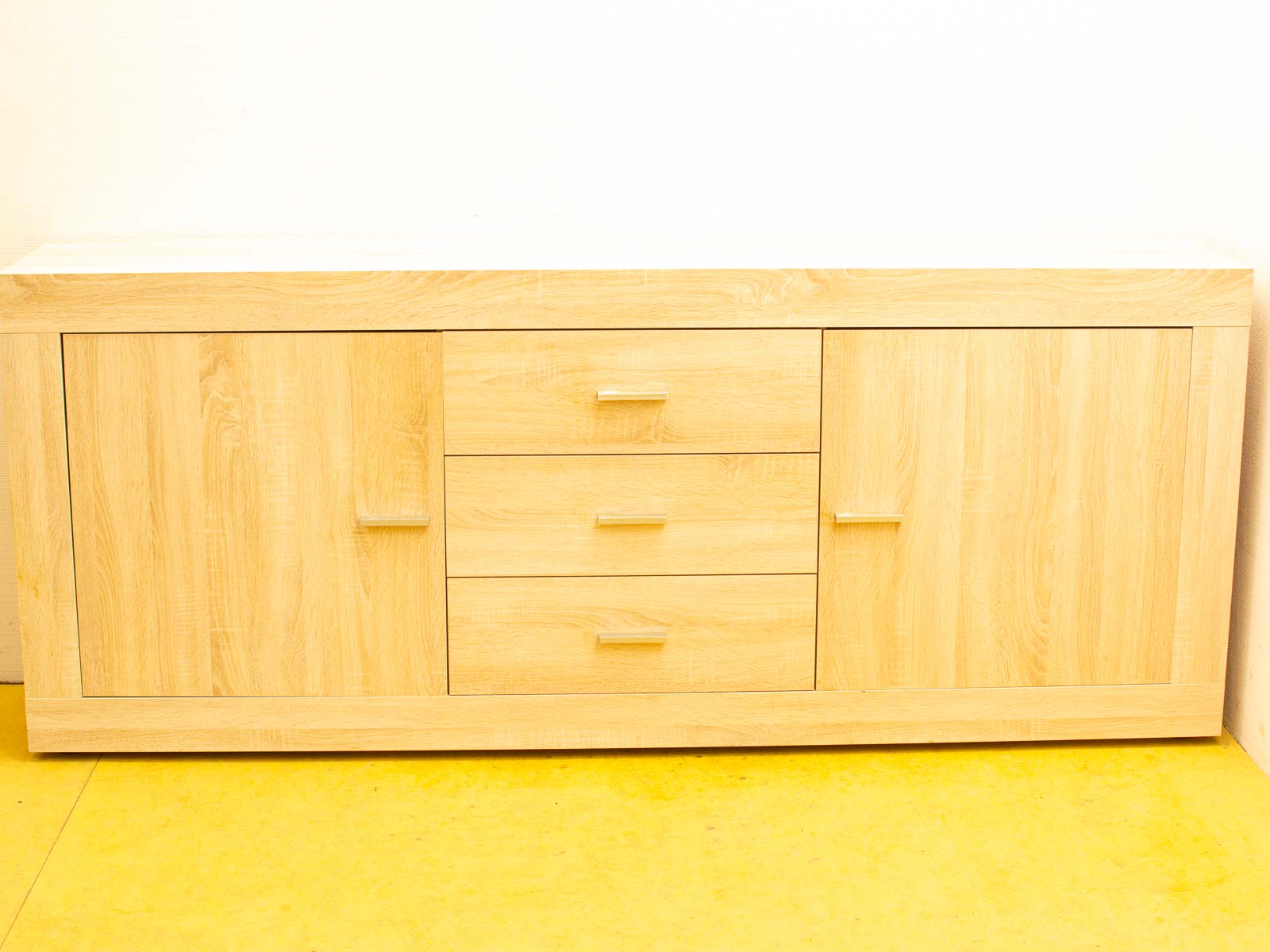 Modern minimalist wood sideboard that enhances any interior with functionality and elegance.