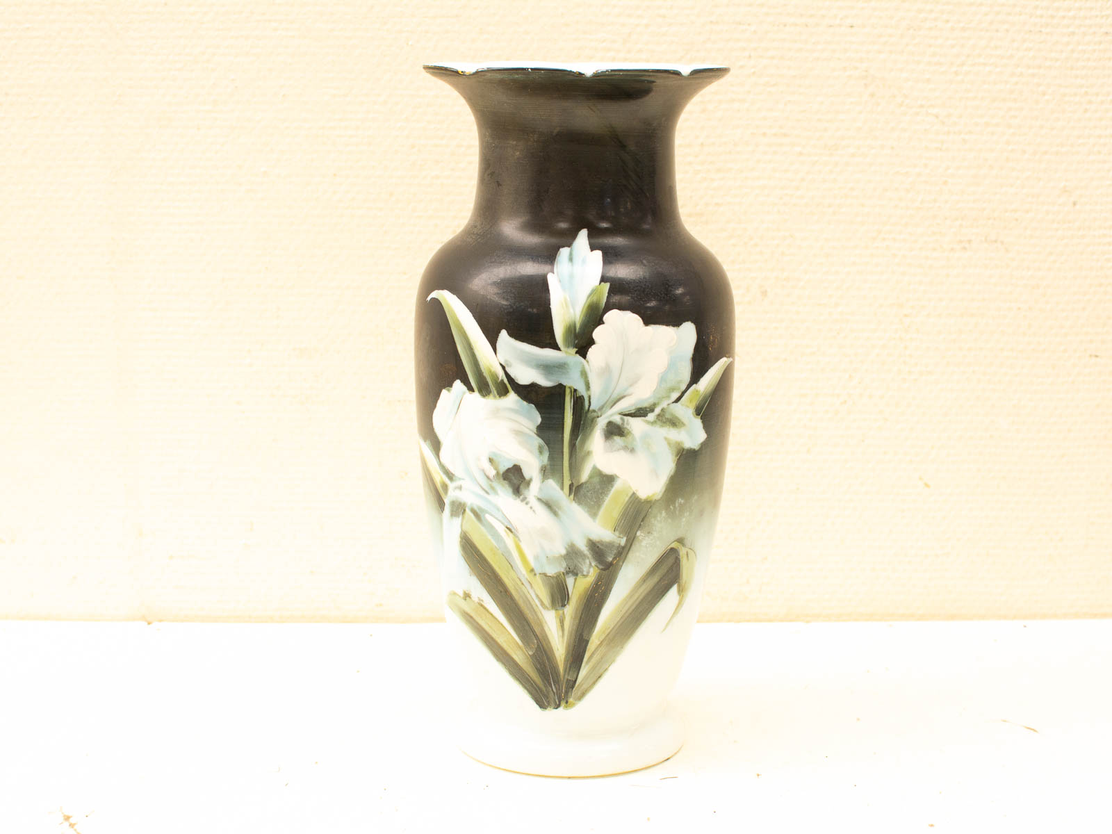 Elegant ceramic vase with floral design, perfect for home decor and showcasing fresh flowers.