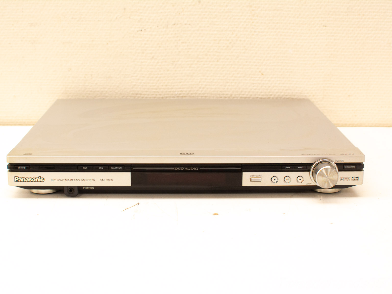 Sleek Panasonic SA-HT860 DVD player in silver, perfect for modern home entertainment setups.