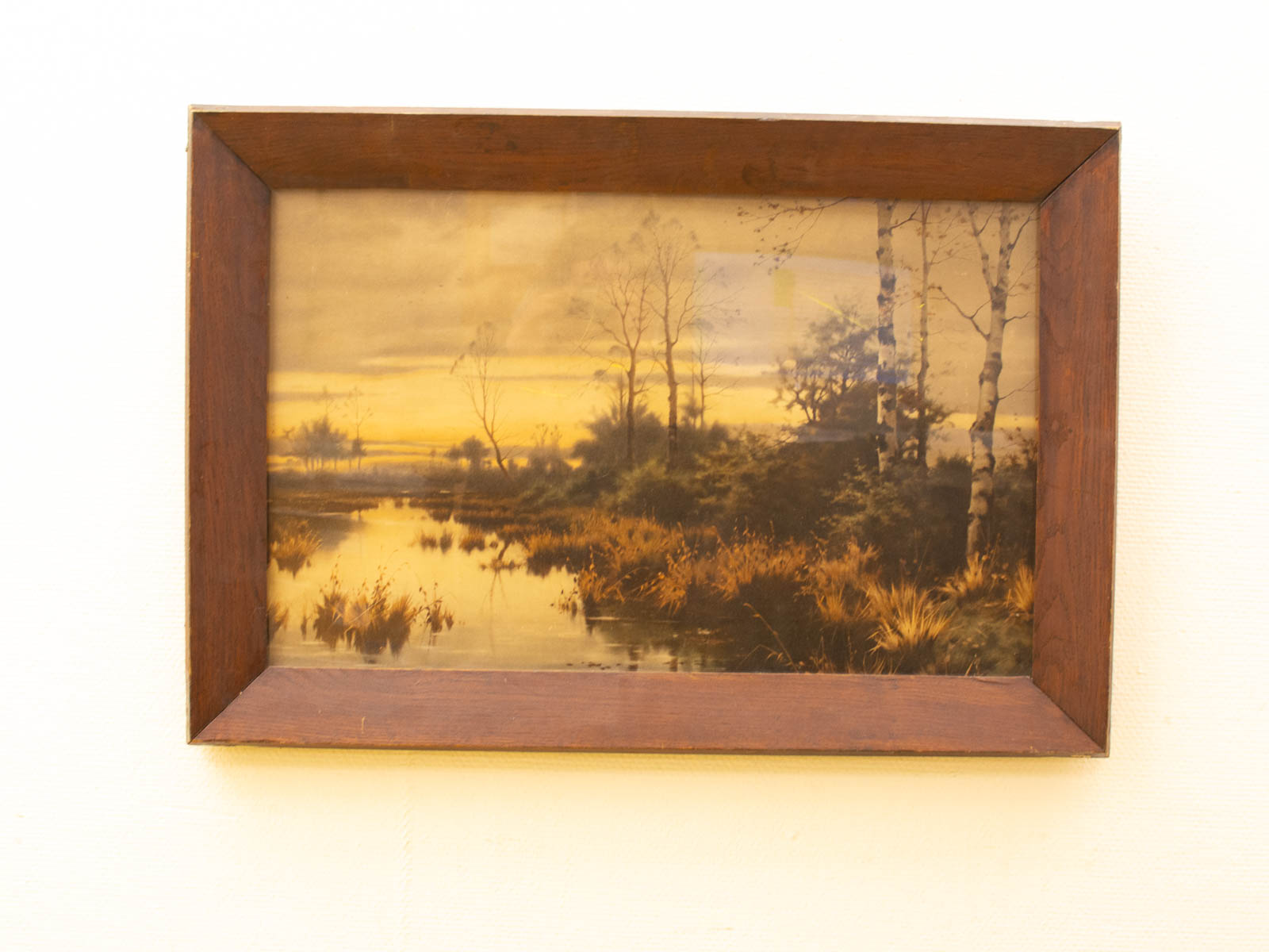 Tranquil sunset landscape painting with water reflection and rustic charm.