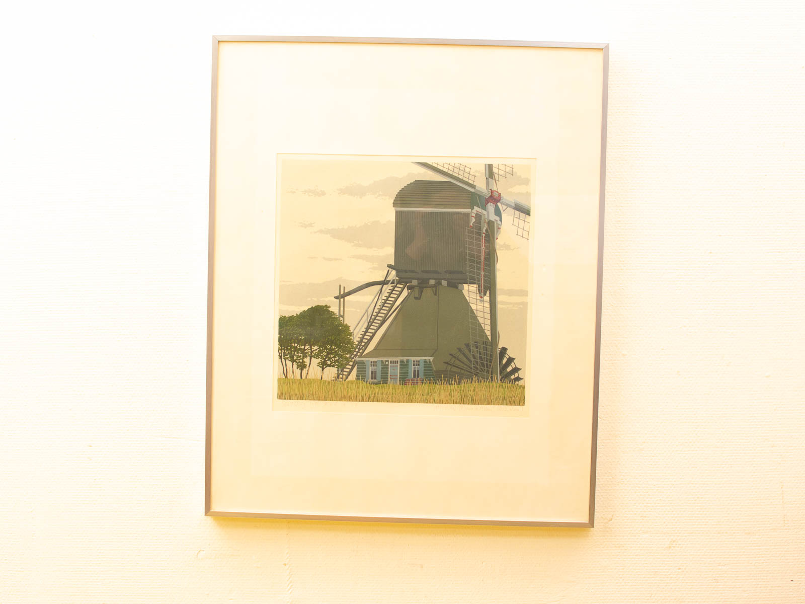 Tranquil windmill in a peaceful rural landscape, showcasing traditional craftsmanship and natural beauty.