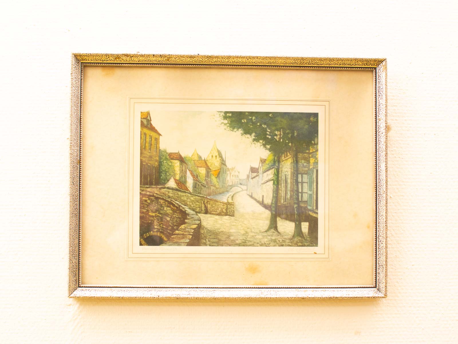 Charming vintage painting of a serene village street, evoking nostalgia and tranquility.