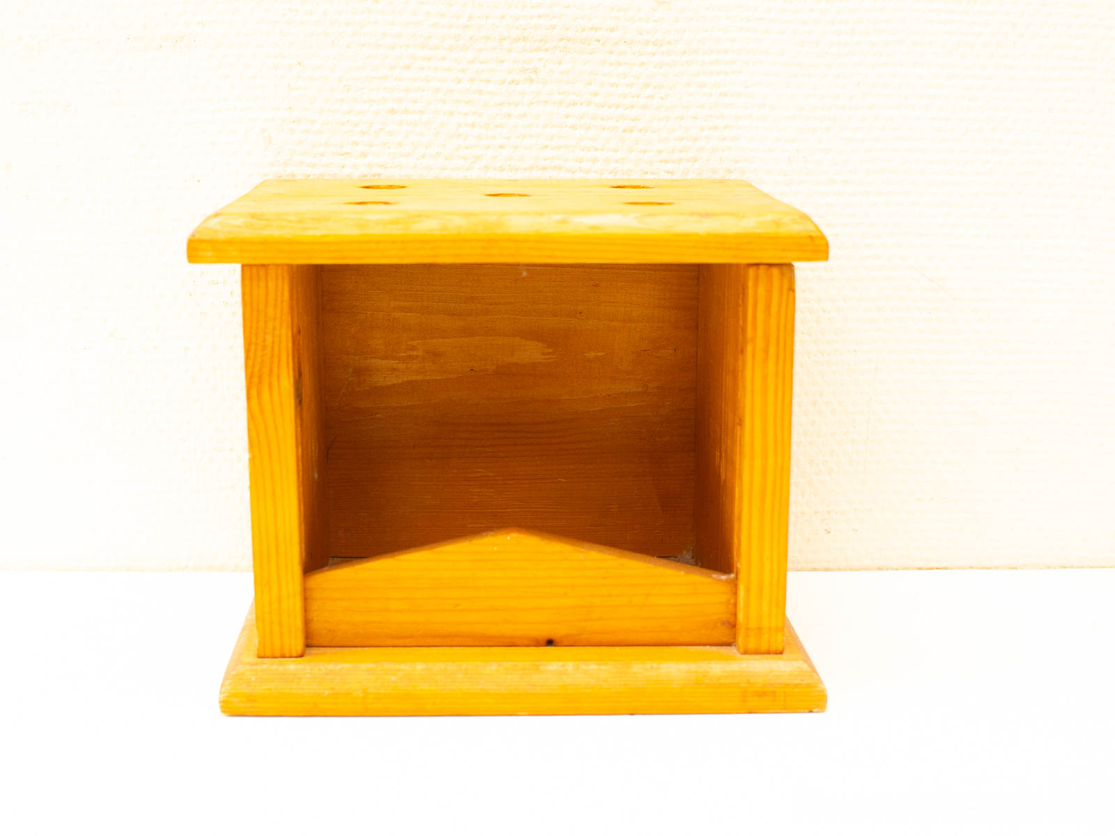 Rustic wooden storage box with an open front, perfect for organizing or decorative use.