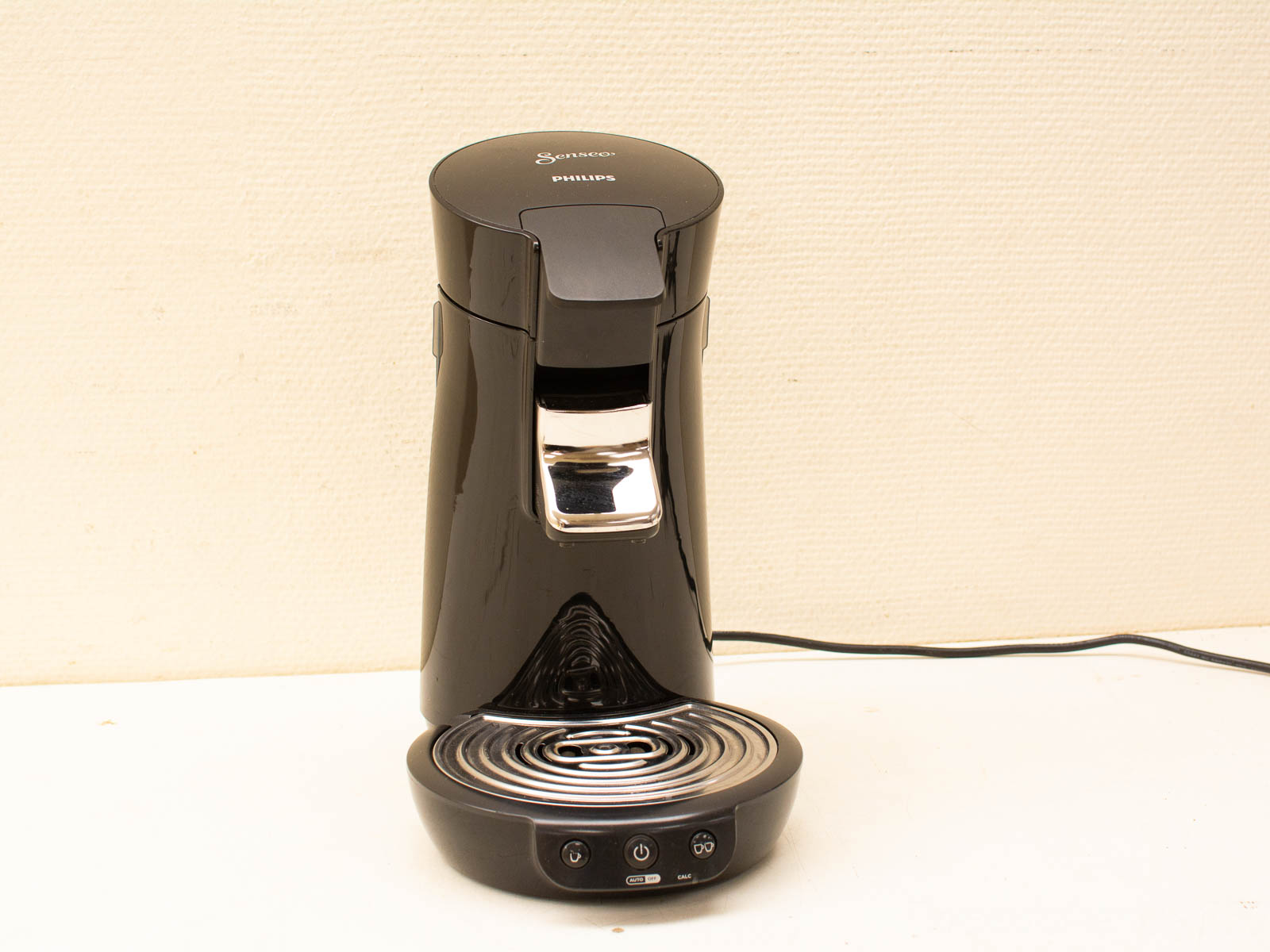 Sleek black Senseo coffee maker, perfect blend of modern style and functionality for coffee lovers.