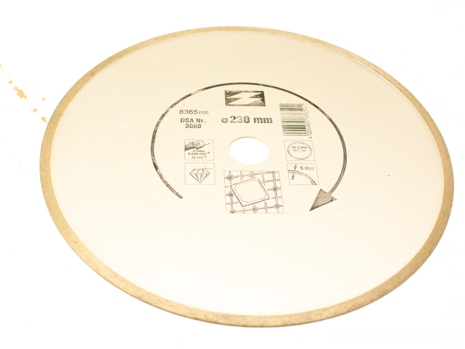 Beige 230mm cutting disc with label, logo, and specifications on a white background.