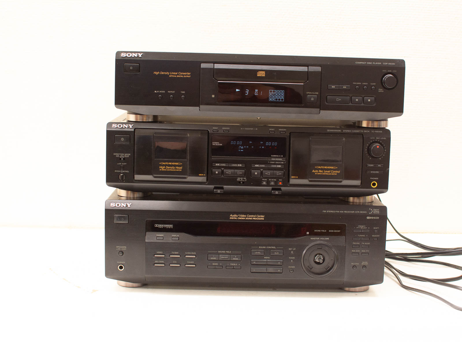 Classic Sony audio system: CD player, cassette deck, and control center for premium sound experiences.