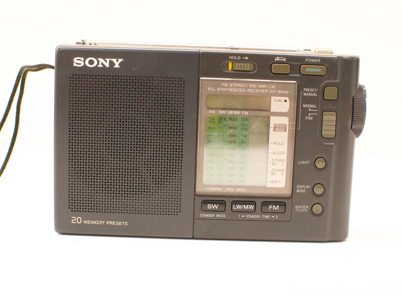 Compact matte black Sony portable radio with clear display and 20 preset stations.