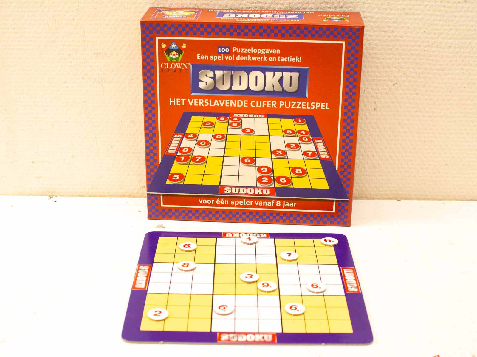 Colorful Sudoku game set with engaging board, tokens, and numbers for ages 8 and up.