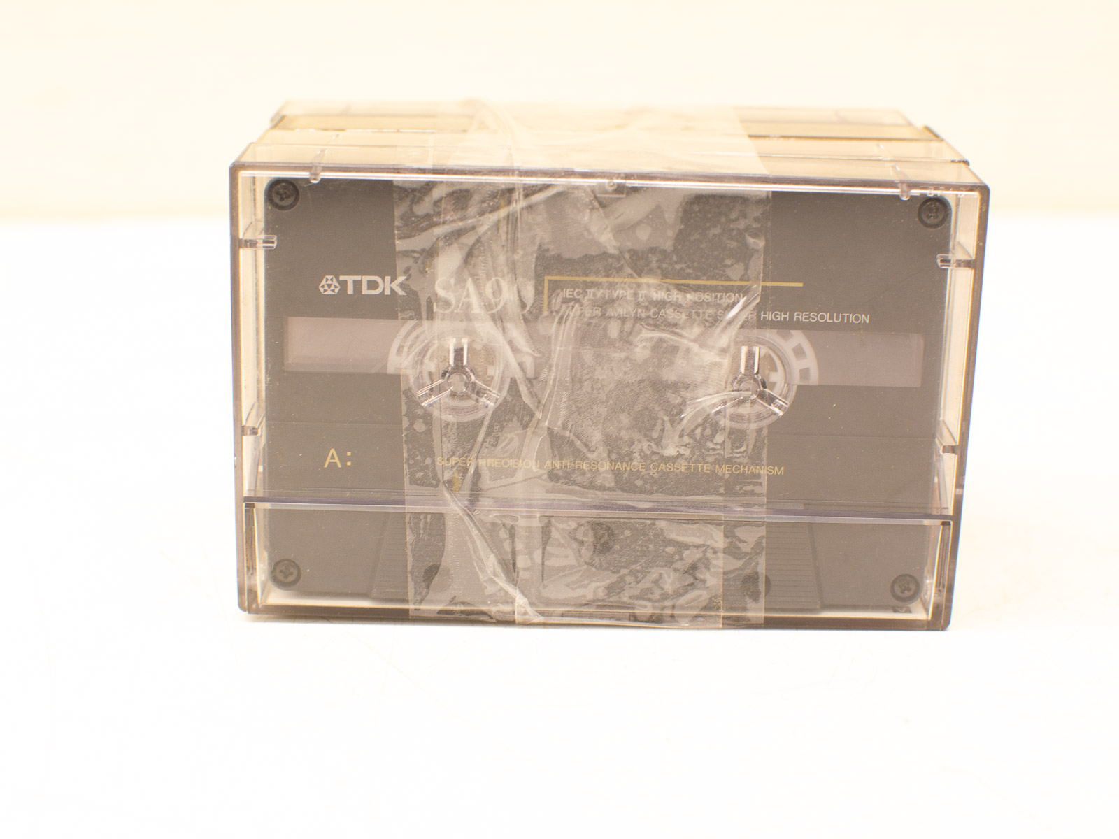 Vintage TDK SA9 cassette tape showcasing high-quality audio in a classic transparent case.