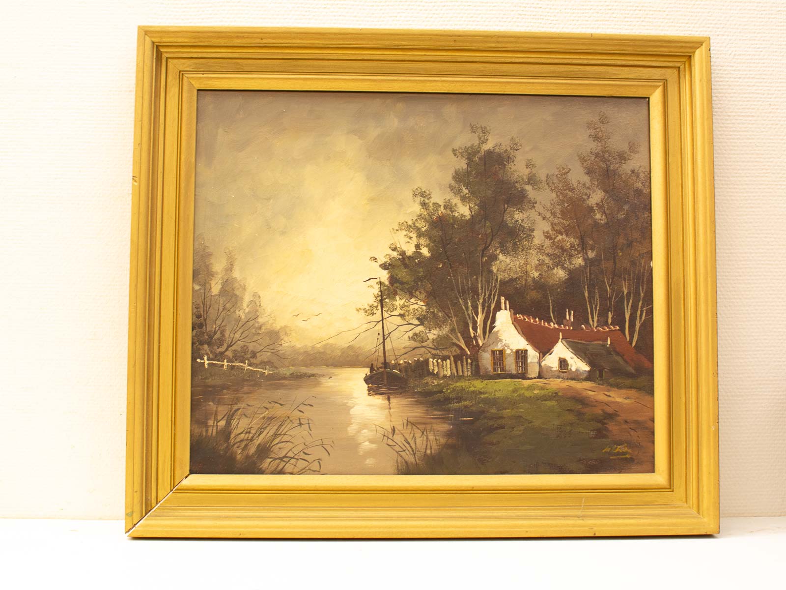 Serene riverside cottage painting at dusk, reflecting natures beauty in warm hues.