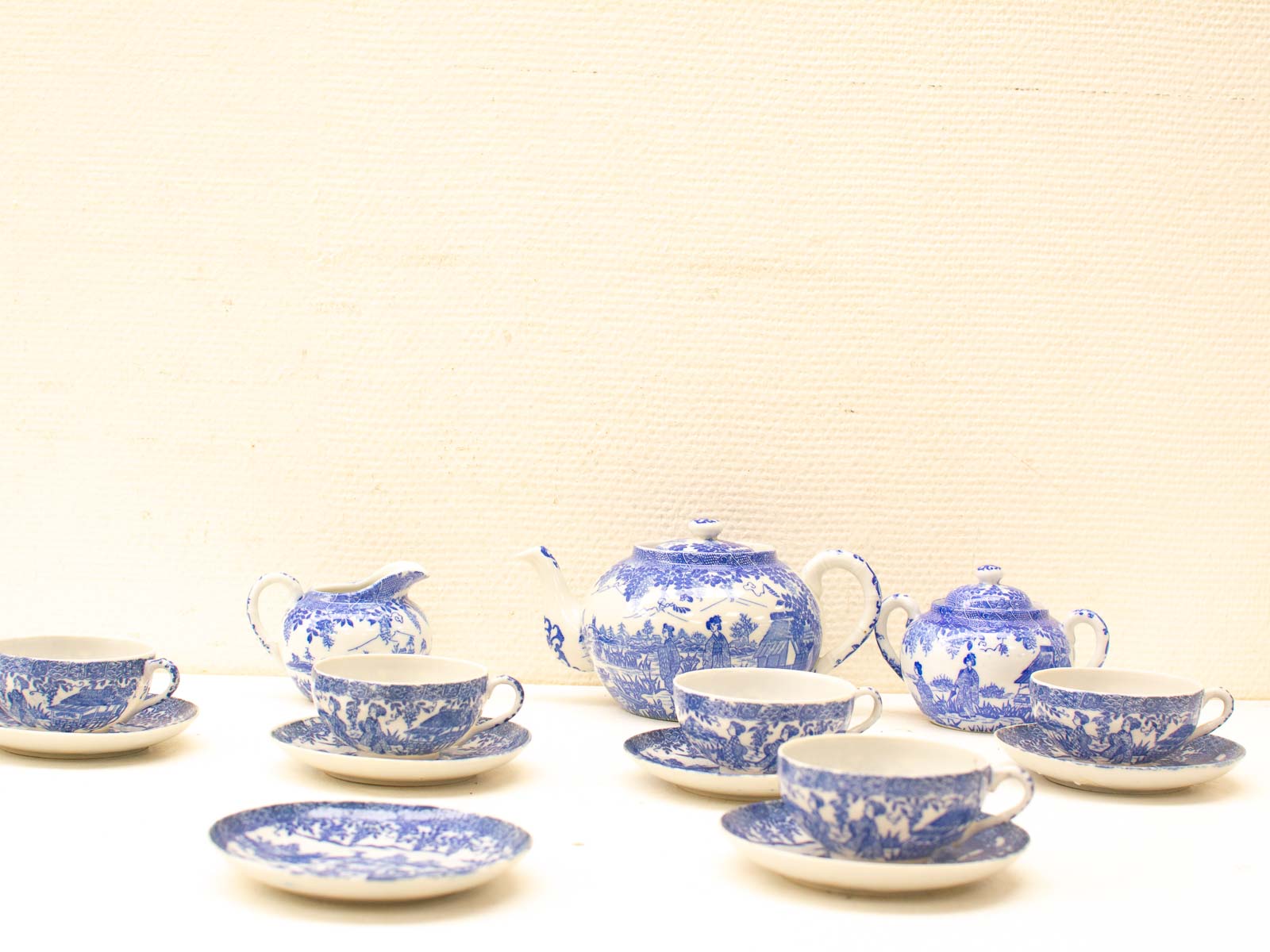 Elegant vintage blue and white porcelain tea set, perfect for charming afternoon gatherings.