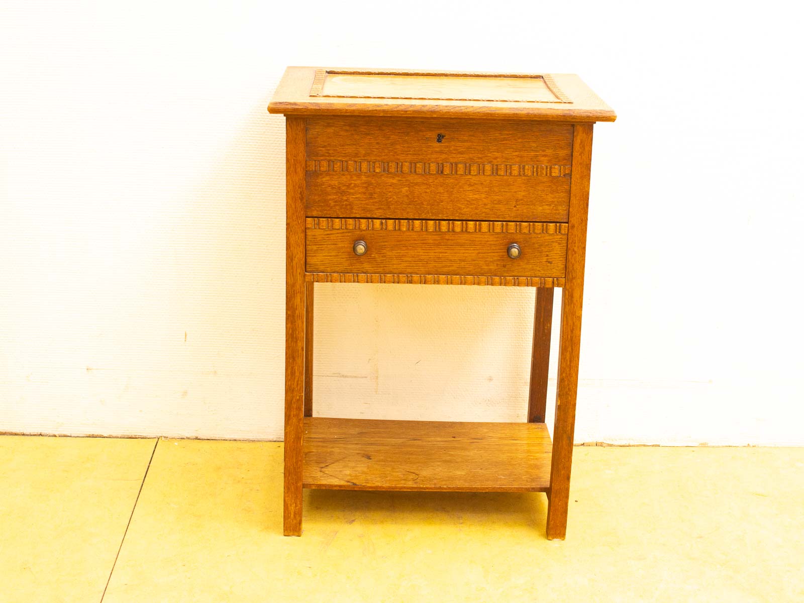 Rustic wooden side table with two drawers and a shelf, perfect for any home decor.