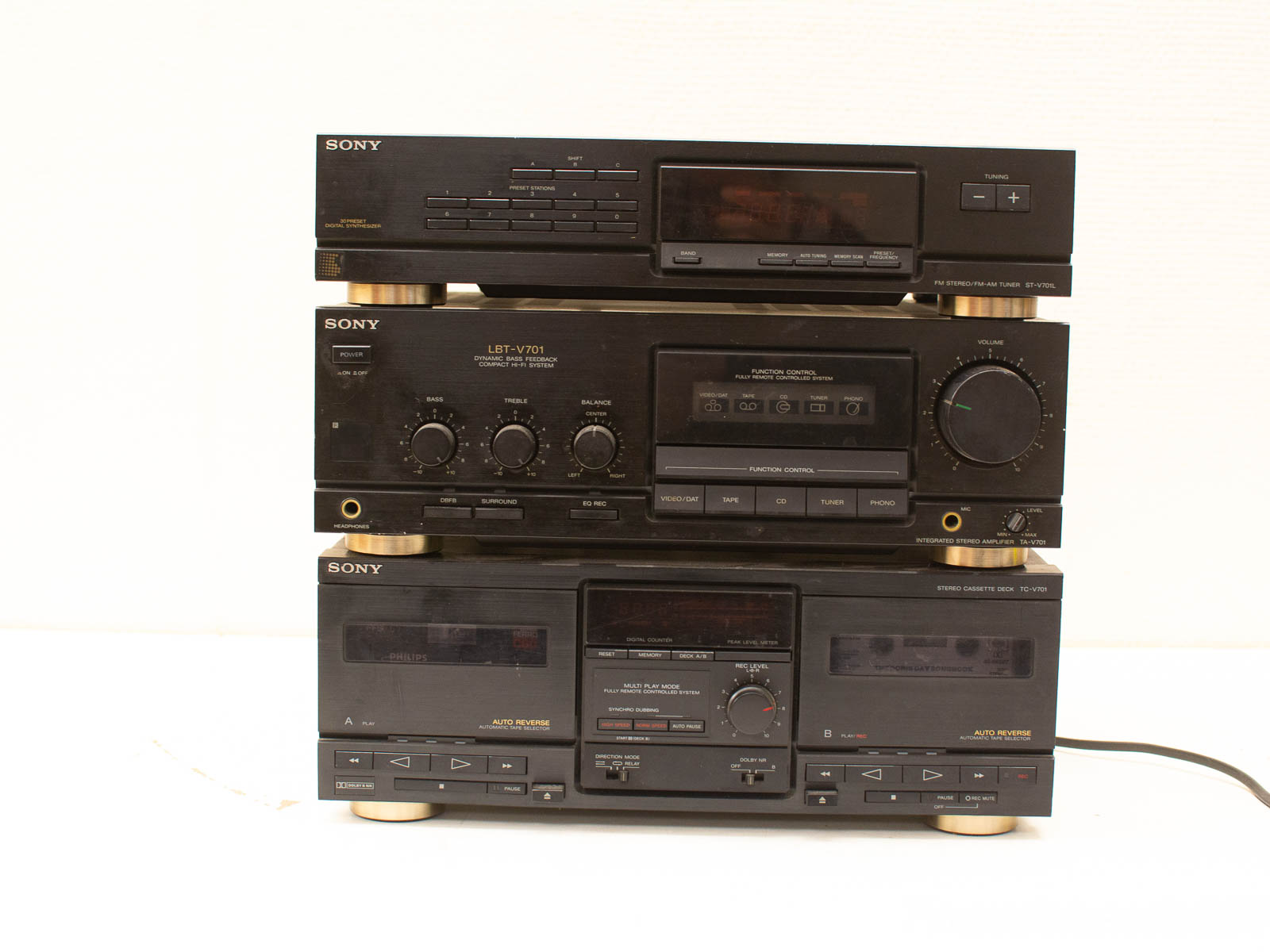 Classic Sony audio set with tuner, amplifier, and cassette deck for vintage music enthusiasts.