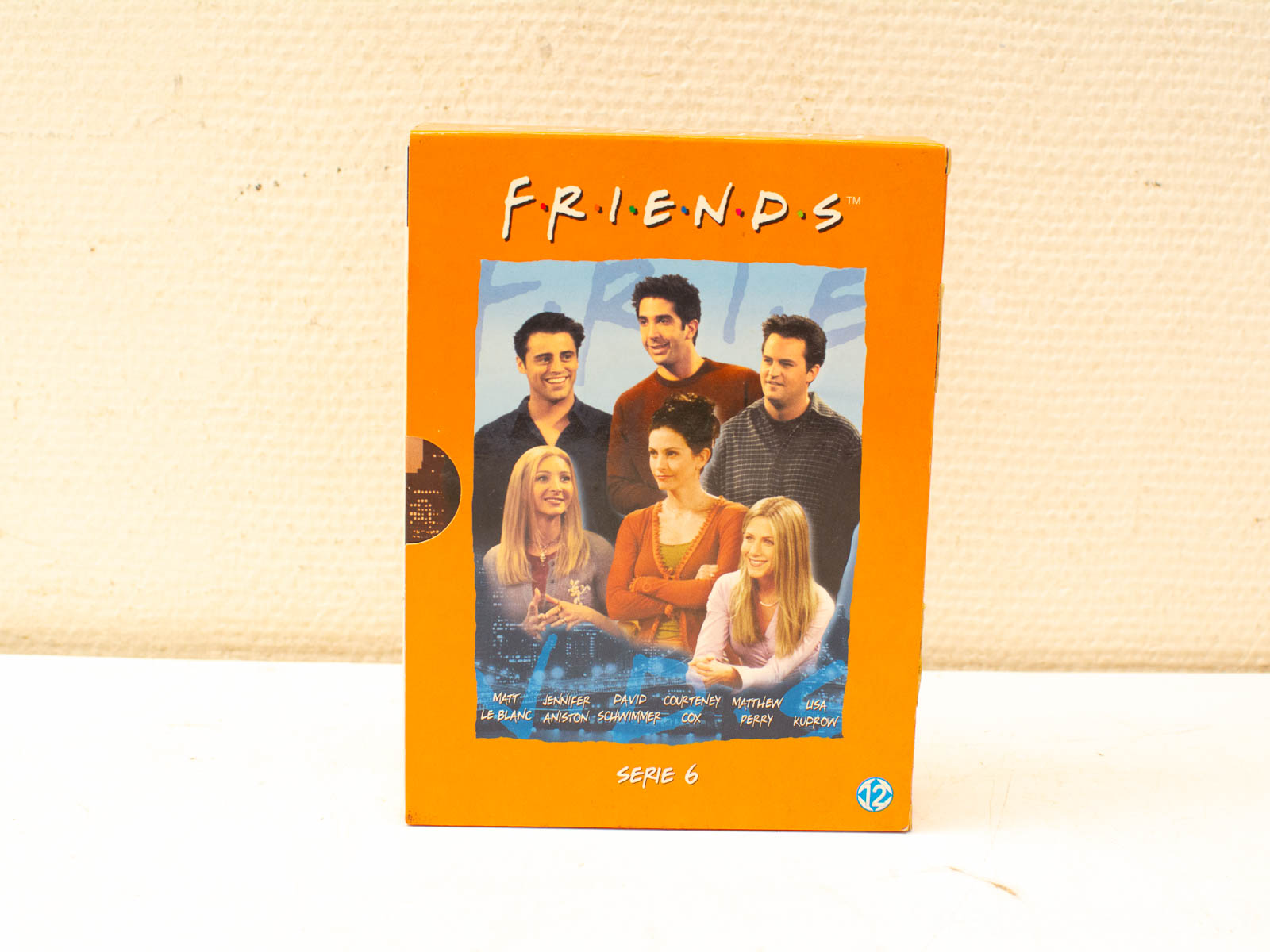 Vintage Friends Season 6 DVD box set, featuring iconic cast and vibrant artwork for collectors.