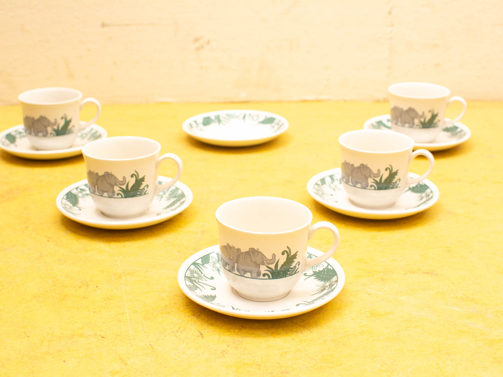 Charming elephant-themed tea cups and saucers set for playful gatherings and decor.