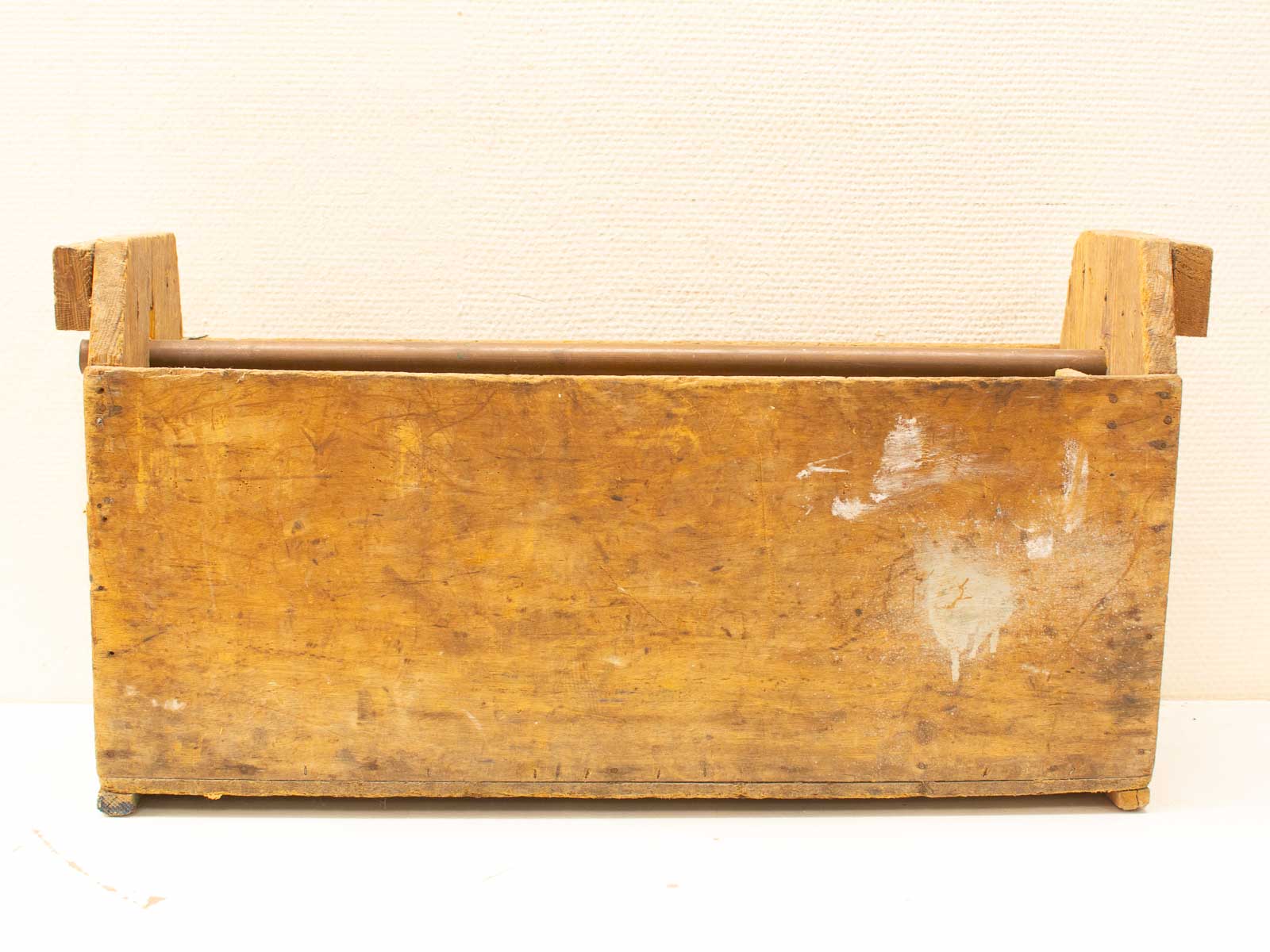 Vintage wooden storage box with handles, showcasing rustic charm and authentic craftsmanship.