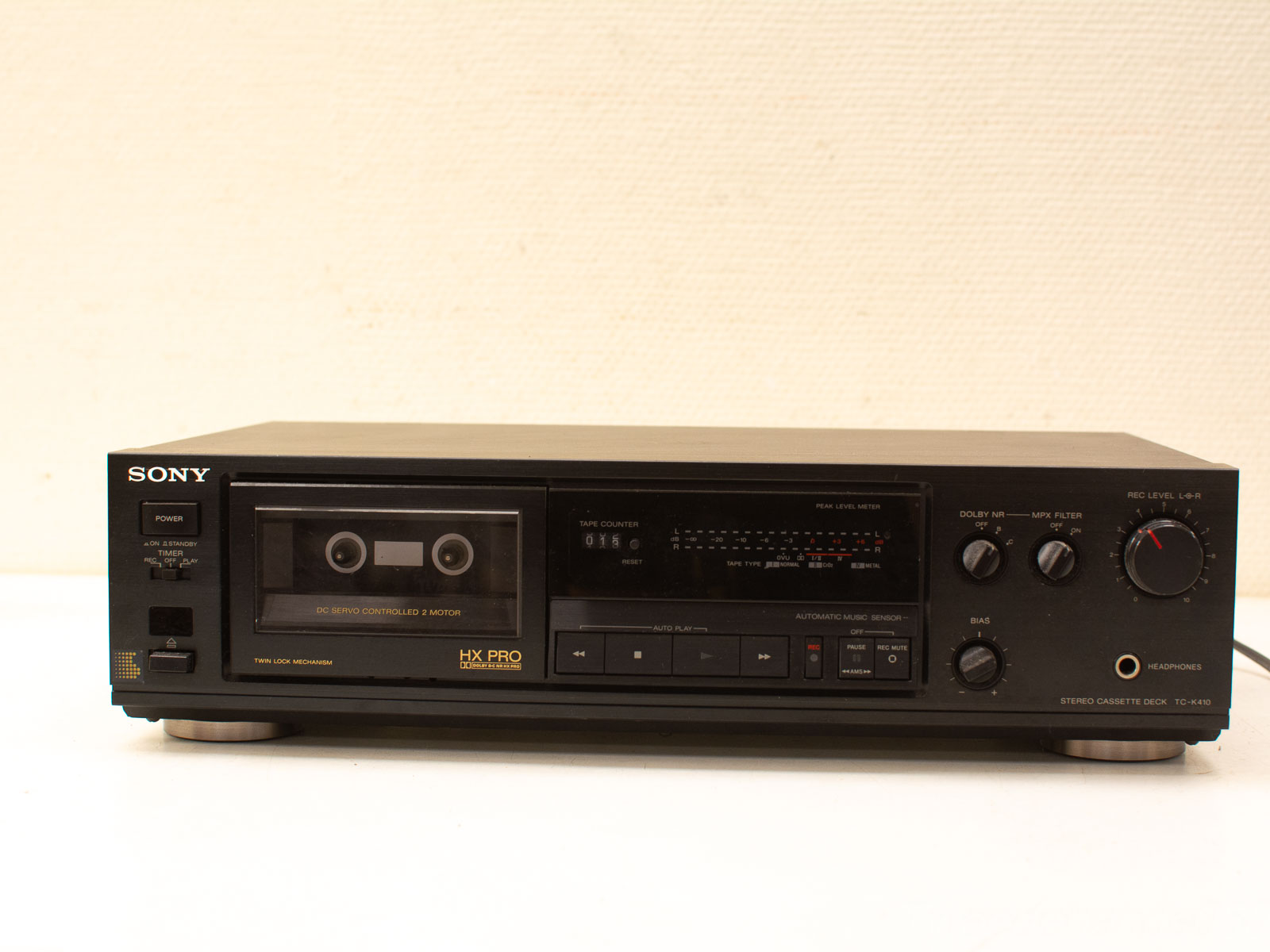 Vintage Sony TC-K410 Cassette Deck with Dolby NR and peak level meter for optimal sound quality.